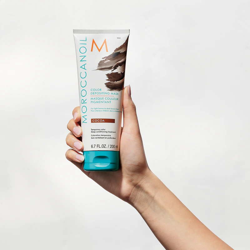 Jemná vyživujúca maska Moroccanoil Color Depositing bez permanentných farebných pigmentov