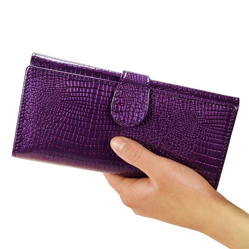 Sac à main long en cuir verni, grande capacité, idéal pour les soirées, avec porte-cartes et pochette.