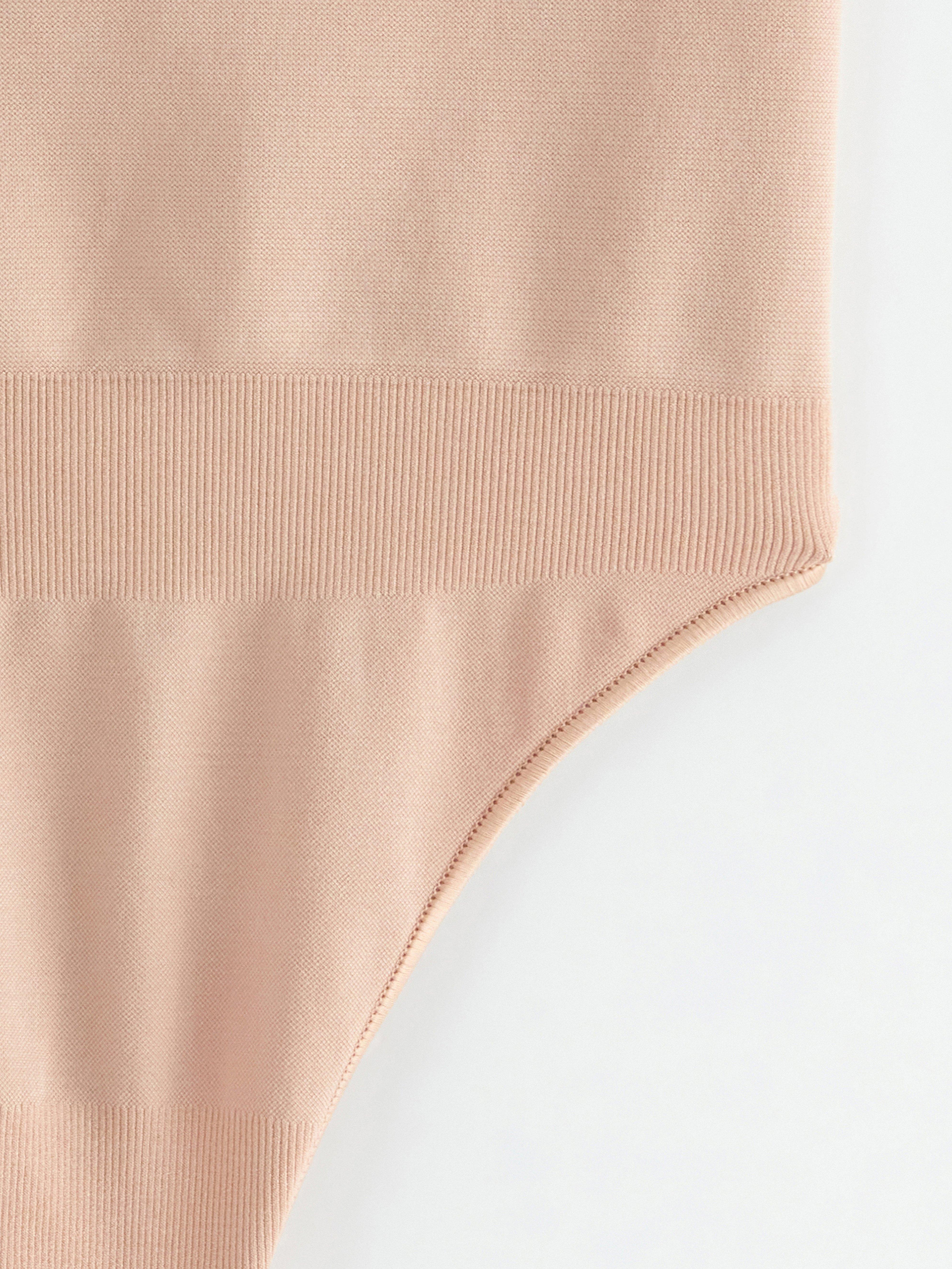 String gainant à maintien zonal beige