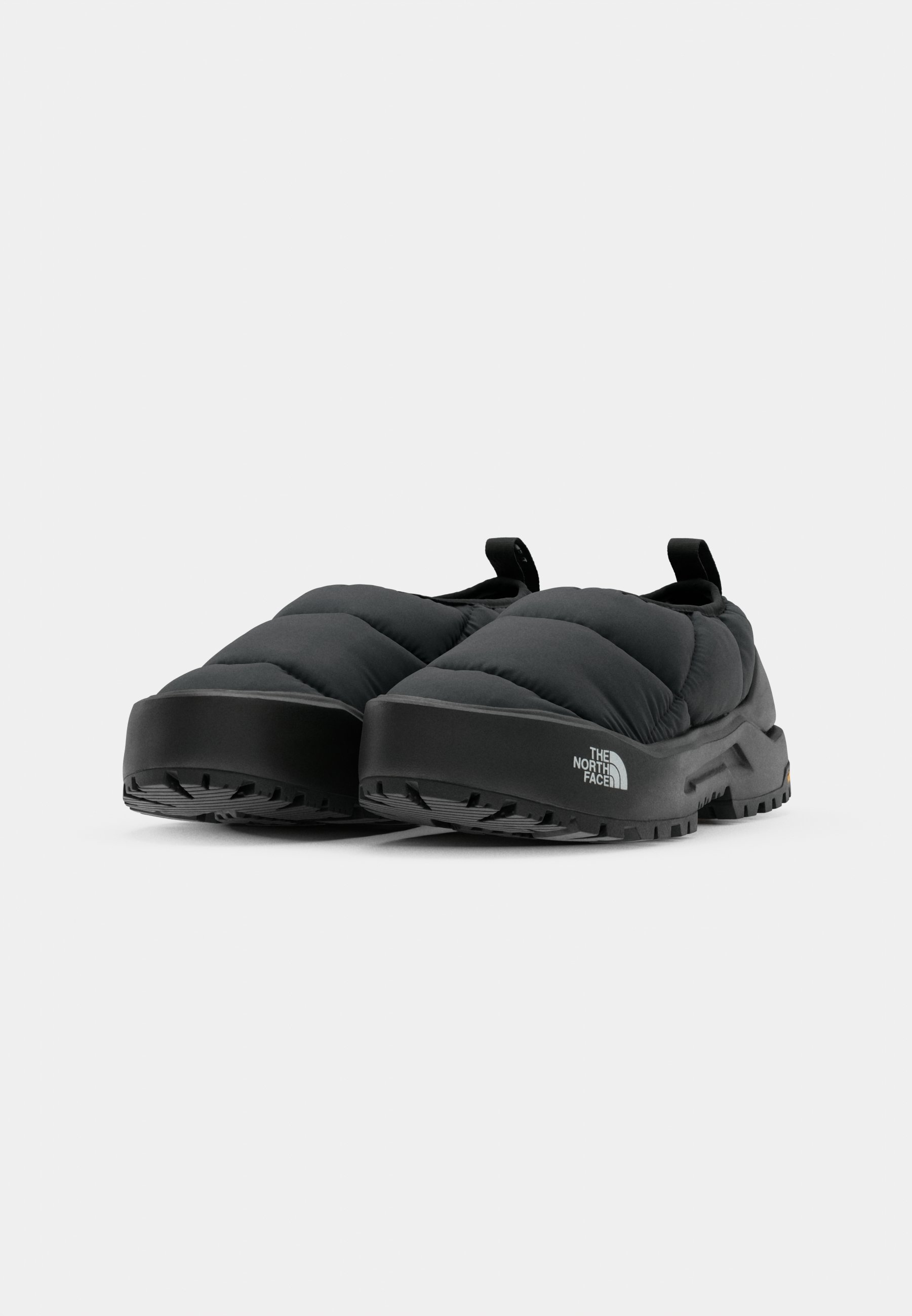 De platte muiltjes van The North Face