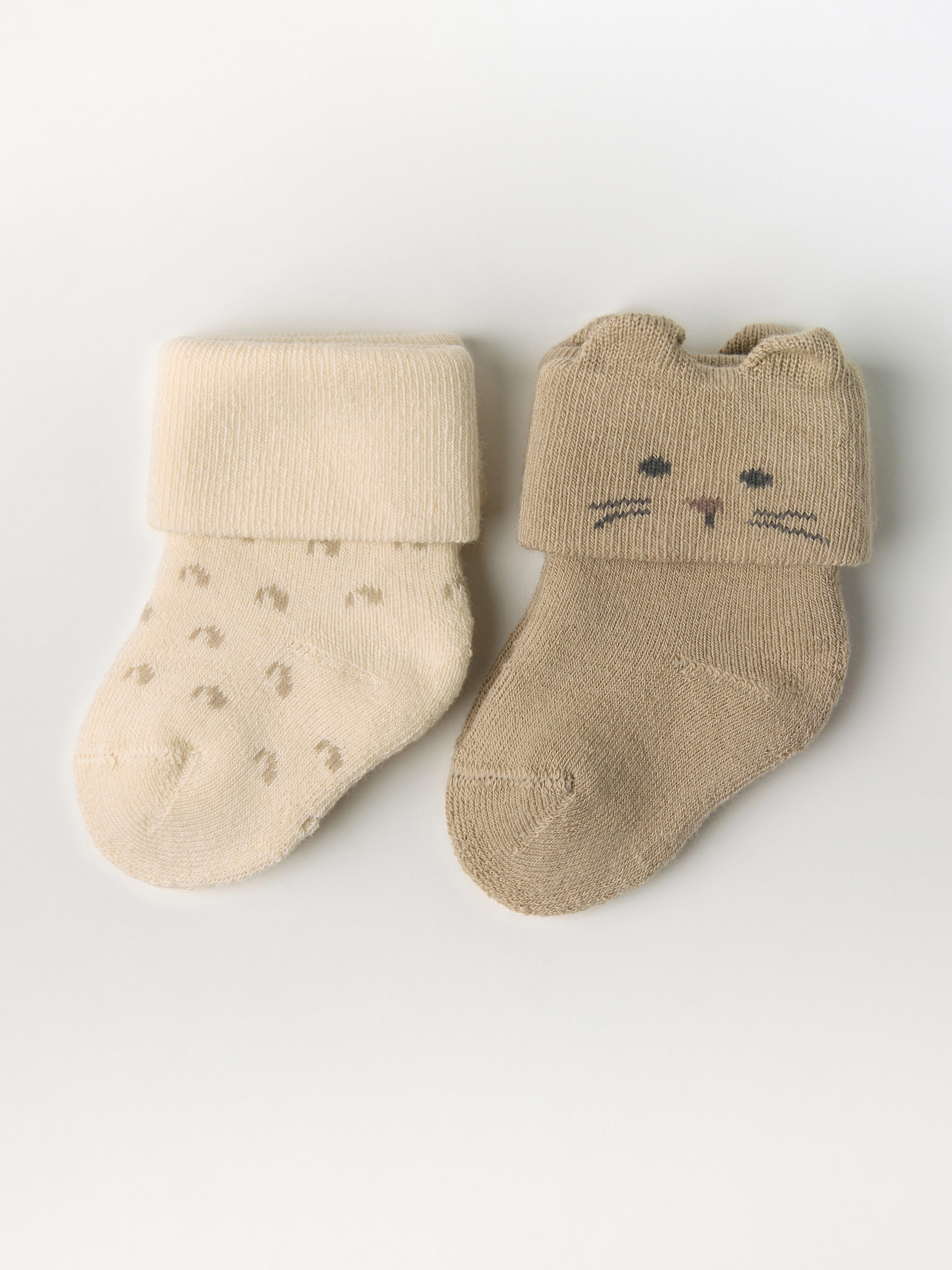 Paquete de 2 trumper frotado Beige
