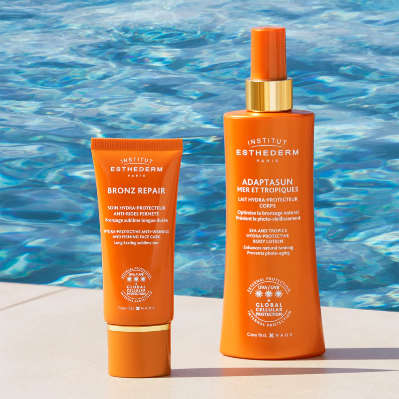 Loção protetora corporal Adaptasun da Institut Esthederm com proteção solar de alta resistência aos raios UV.