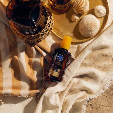 Nivea Sun sprej za tijelo s uljem od mrkve SPF 6 200 ml