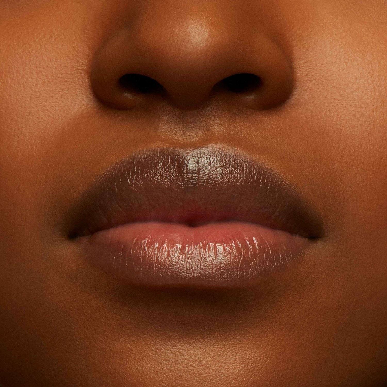 MAC lūpu balzams NOCTURNA Squirt Plumping Stick lūpu spīdums - 2,3 g