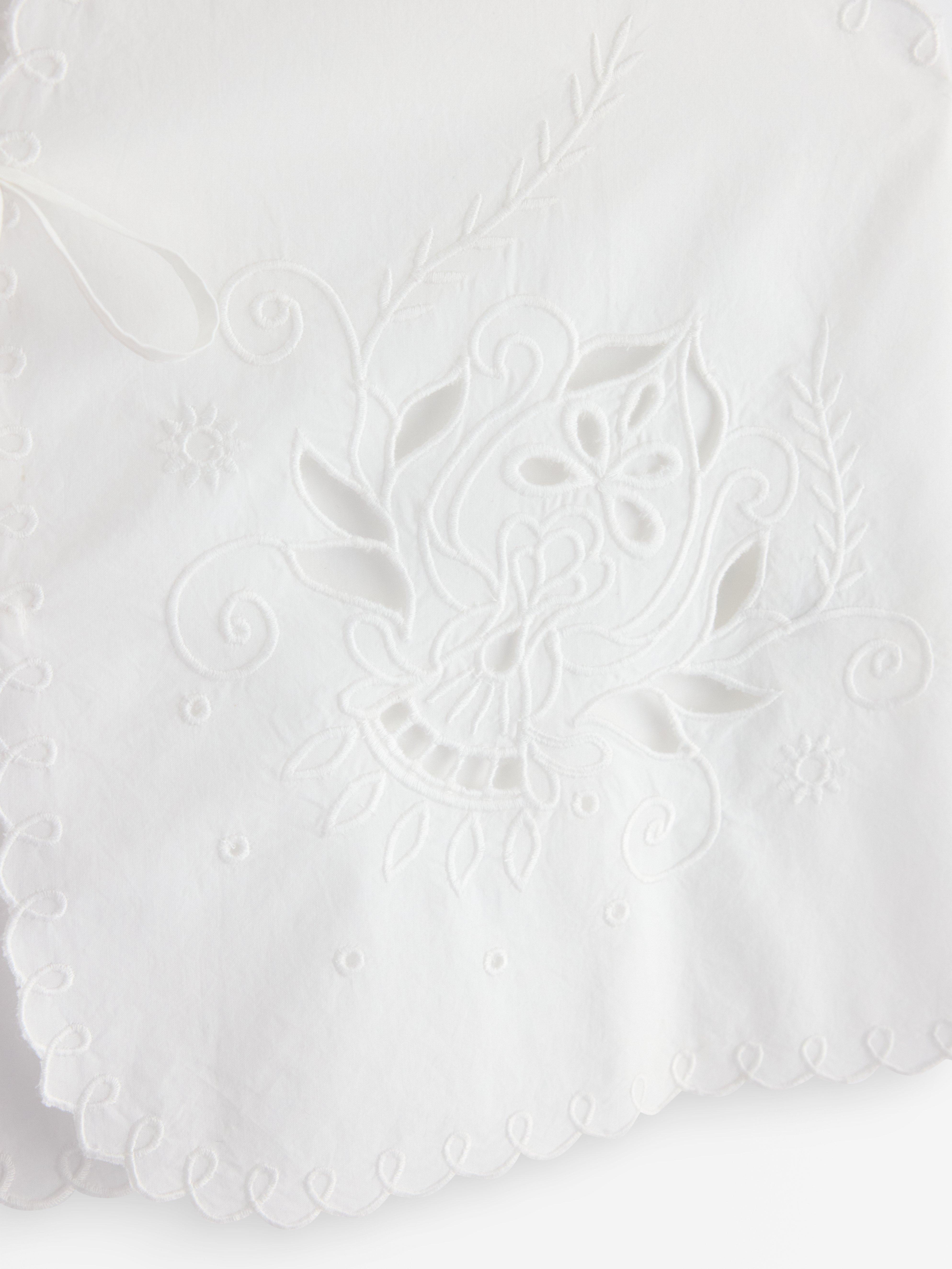 Väst med broderi White