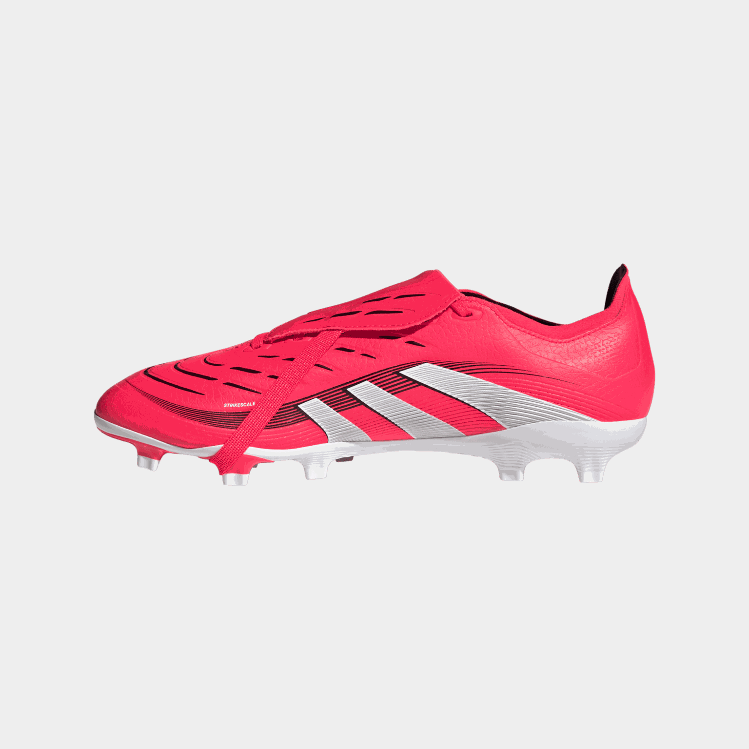 Buty piłkarskie Predator League z wywijanym językiem (FG/MG), przeznaczone do gry na naturalnej i syntetycznej trawie, unisex.
