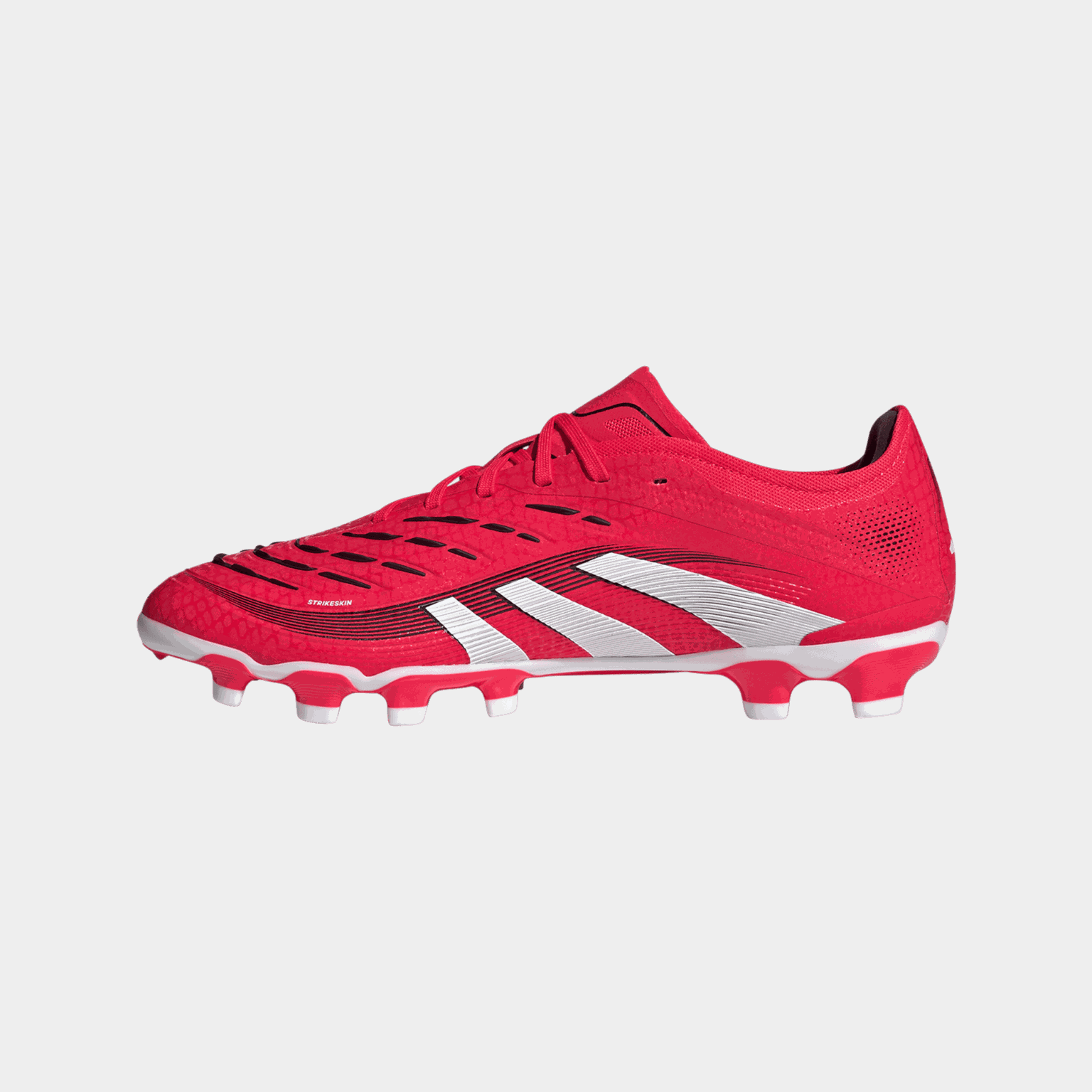 Predator Pro MG, buty piłkarskie unisex do gry na trawie naturalnej i syntetycznej.