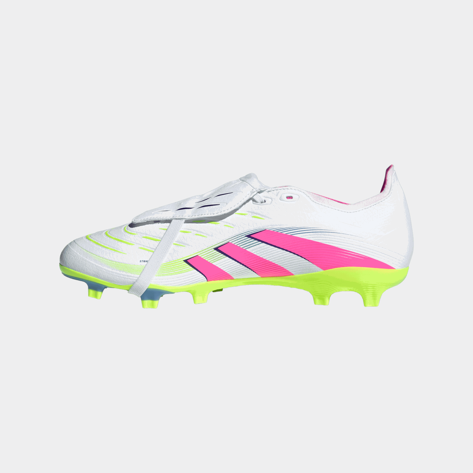 Buty piłkarskie Predator League z wywijanym językiem (FG/MG), przeznaczone do gry na naturalnej i syntetycznej trawie, unisex.