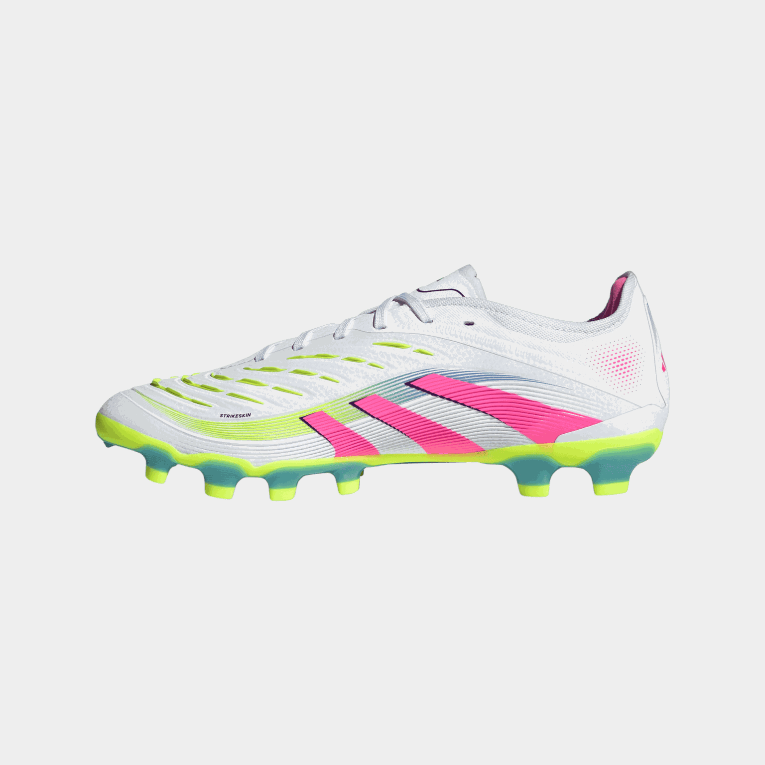 Predator Pro MG, buty piłkarskie unisex do gry na trawie naturalnej i syntetycznej.