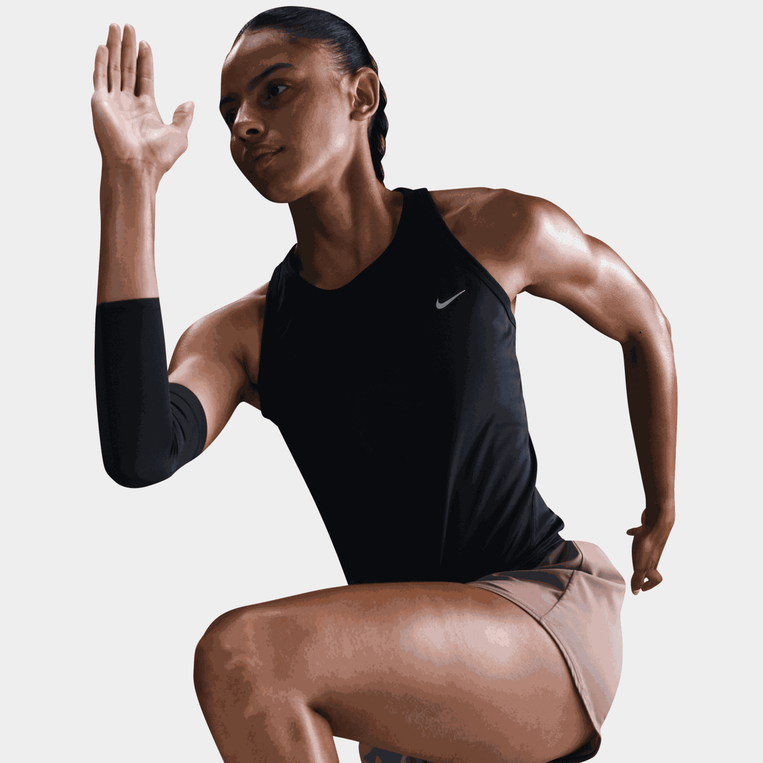 Tempo Dri-FIT mouwloos trainingspak voor dames