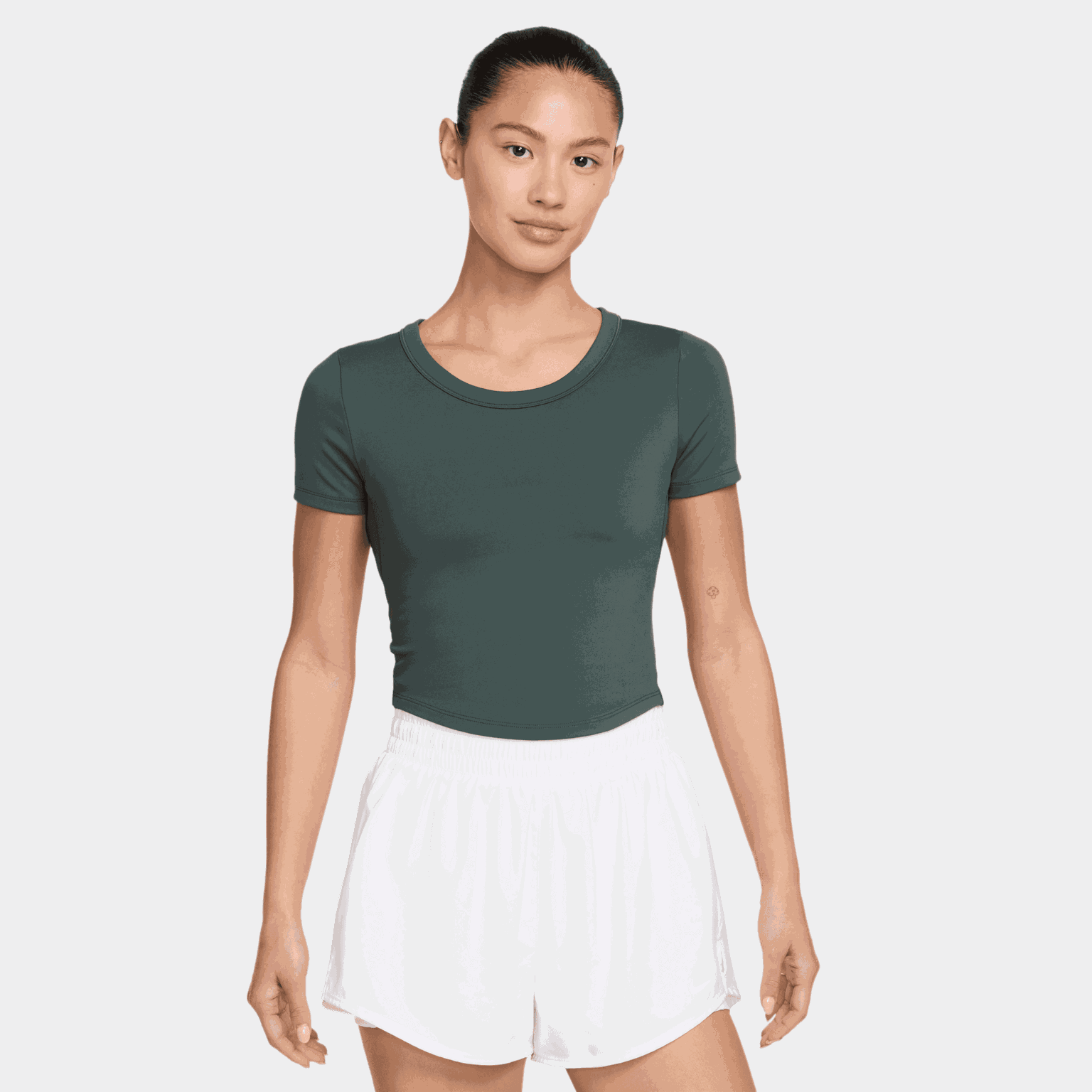  Damski, dopasowany t-shirt/top z krótkim rękawem, wykonany z materiału Dri-FIT.