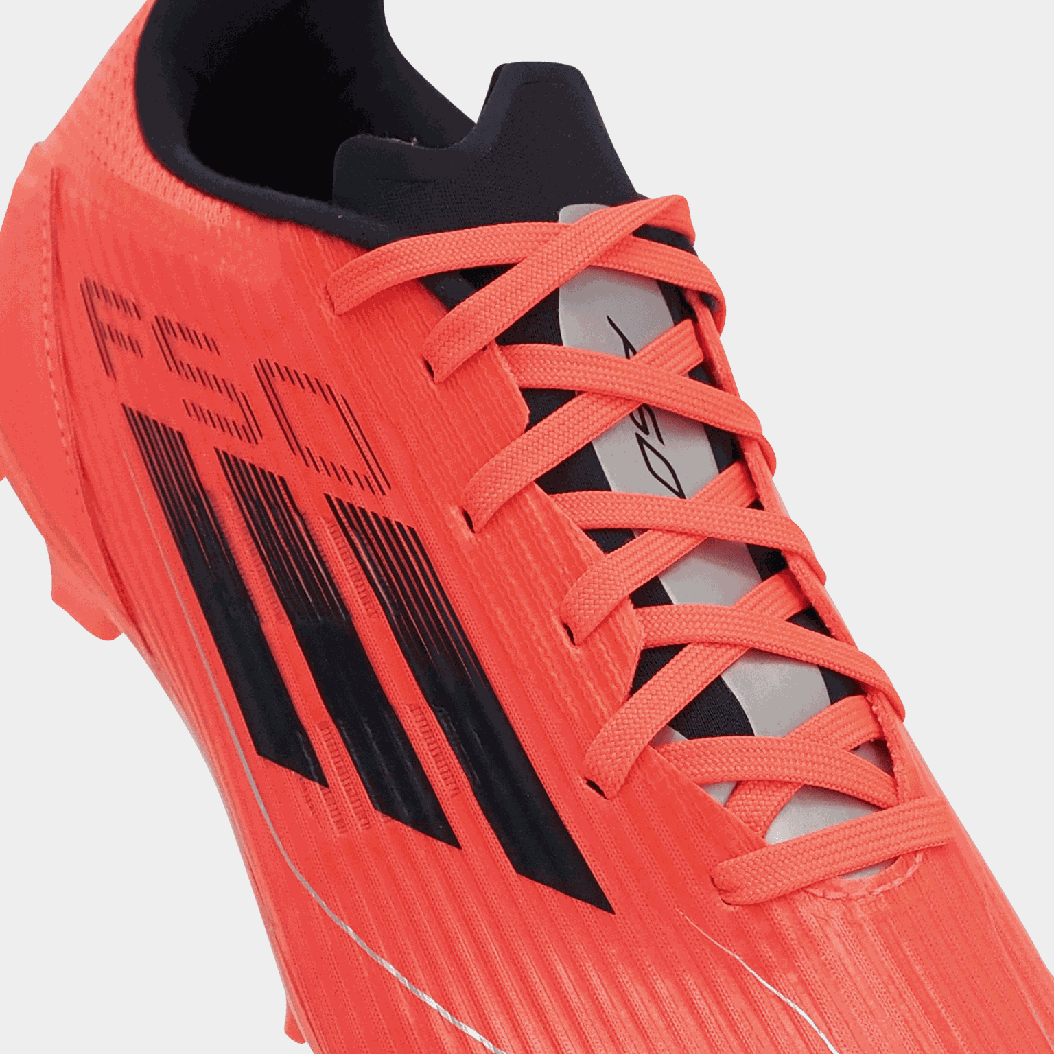 Chaussures de football F50 League FG/MG Q4 24, pour gazon naturel et synthétique, unisexe – Rouge
