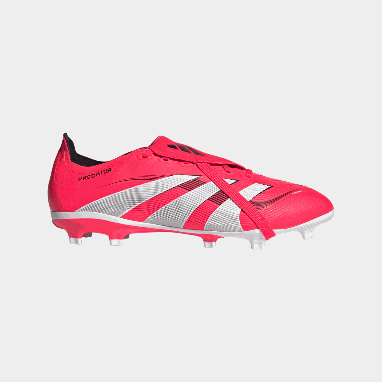 Buty piłkarskie Predator League z wywijanym językiem (FG/MG), przeznaczone do gry na naturalnej i syntetycznej trawie, unisex.