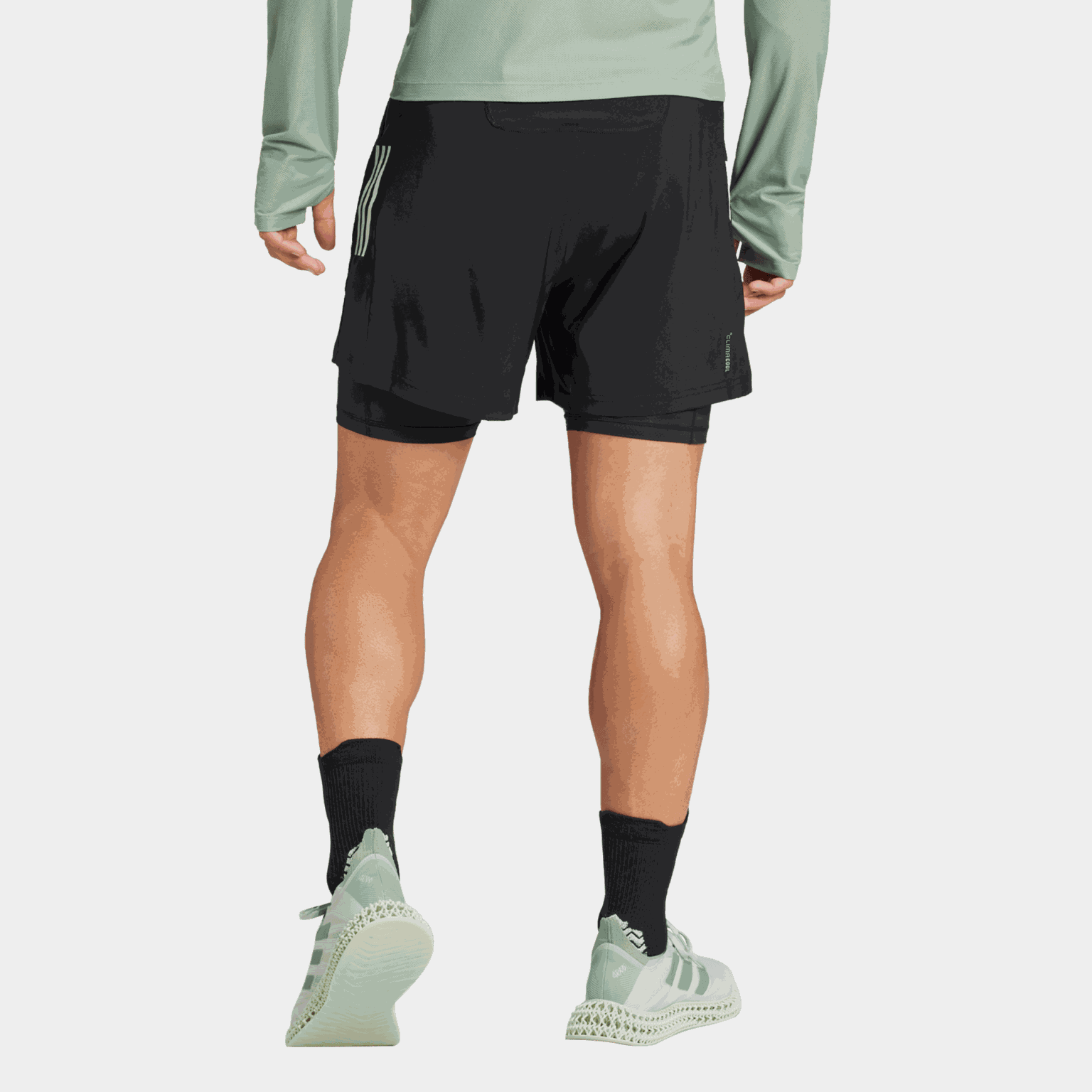 Dominuj w biegu. Męskie spodenki do biegania i treningu CLIMACOOL 2 w 1 – czarne.