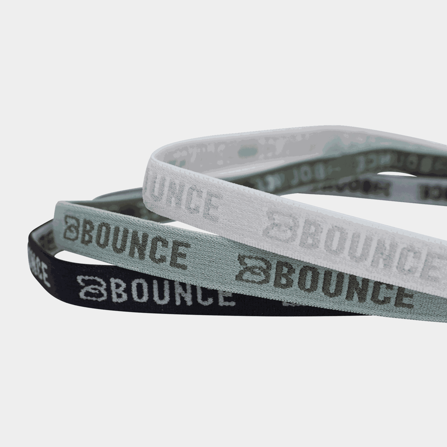 Set van 3 elastische haarbanden van Bounce, ademend en sneldrogend.