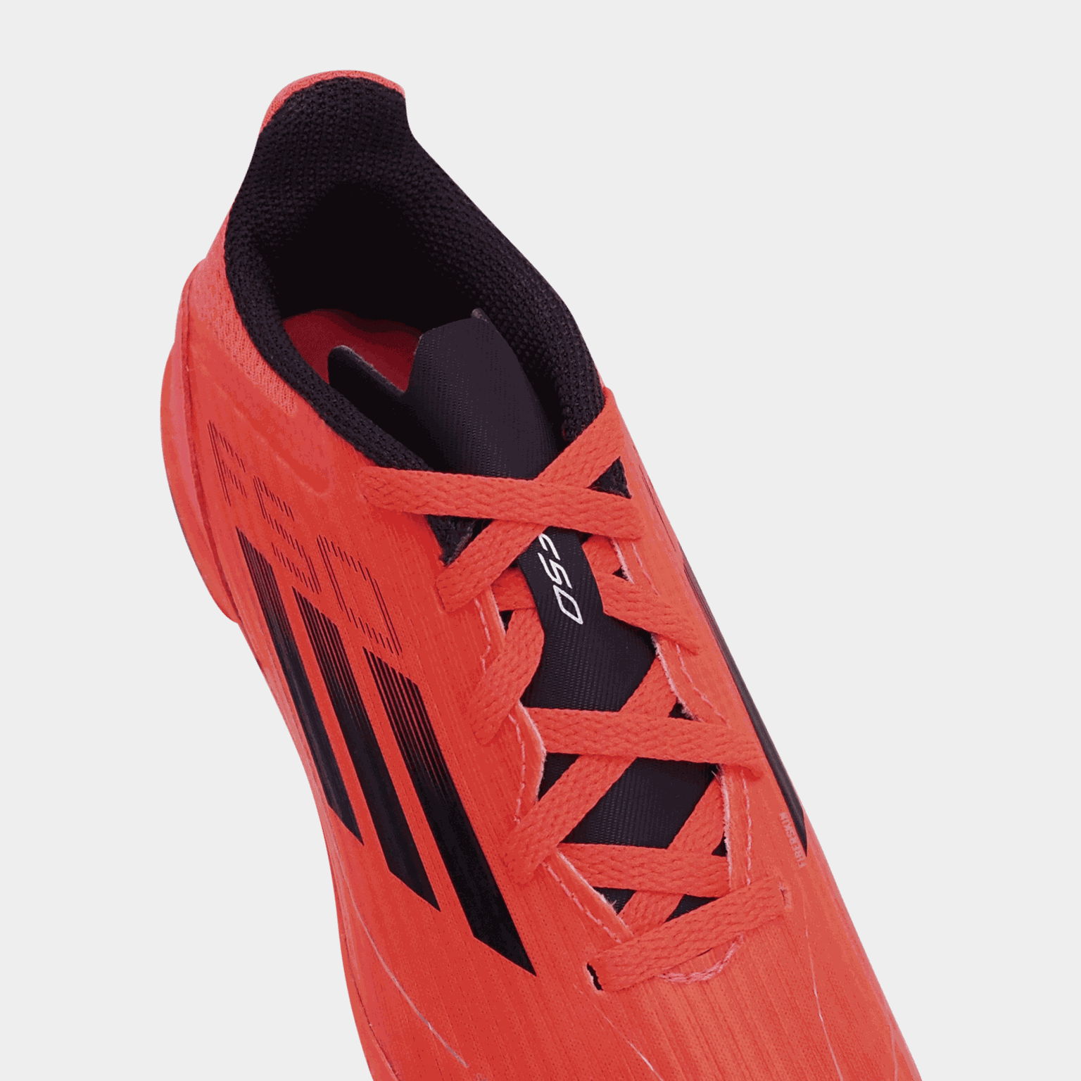 Chaussures de football F50 League TF Q4 24, pour terrains de sable, gazon synthétique et gazon naturel, Juniors - Rouge