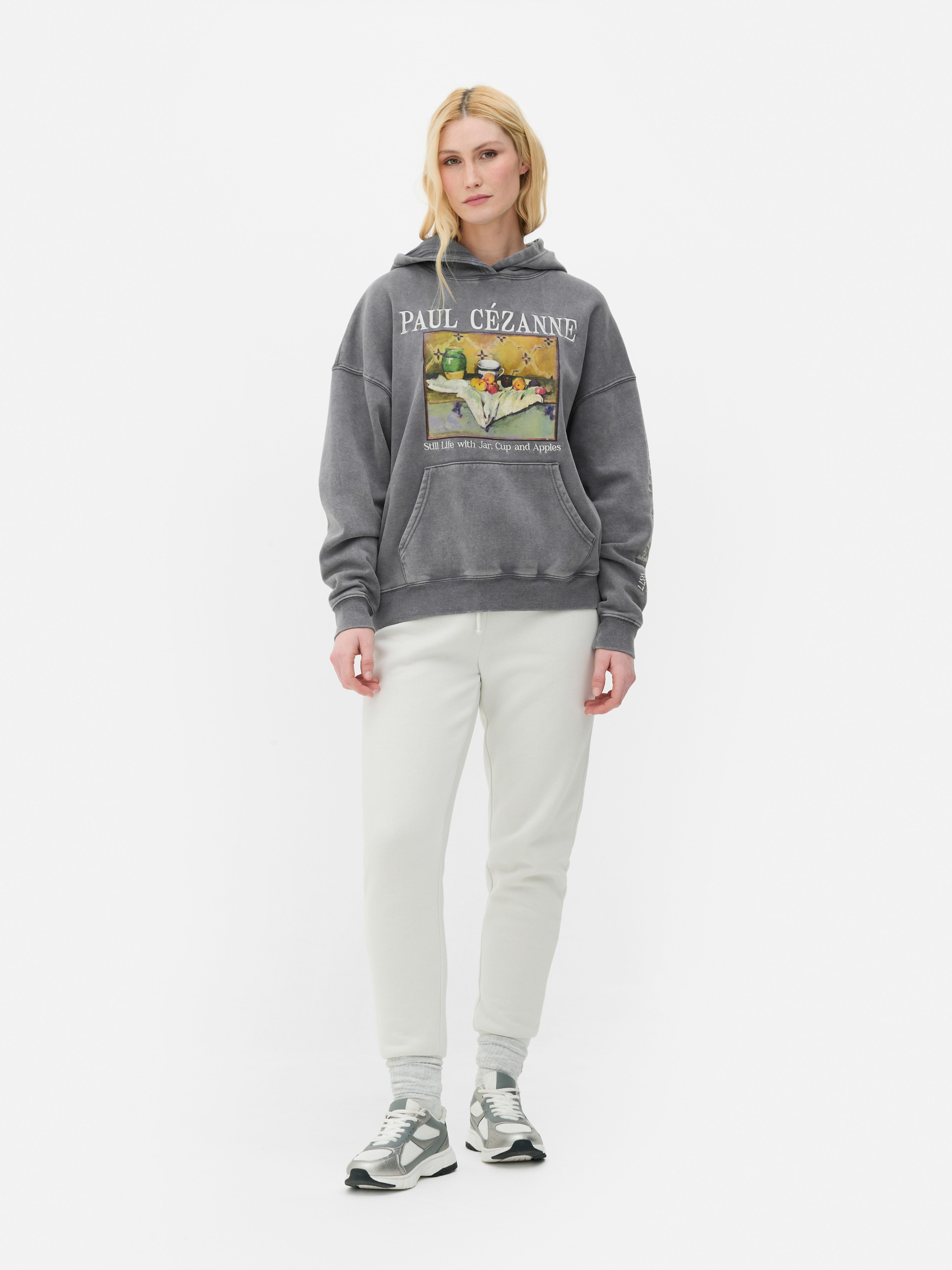 Kapuzenpullover mit Stillleben von Paul Cézanne Ein Vintage-Kapuzenpullover mit Paul Cézannes Stillleben mit Krug, Tasse und Äpfeln