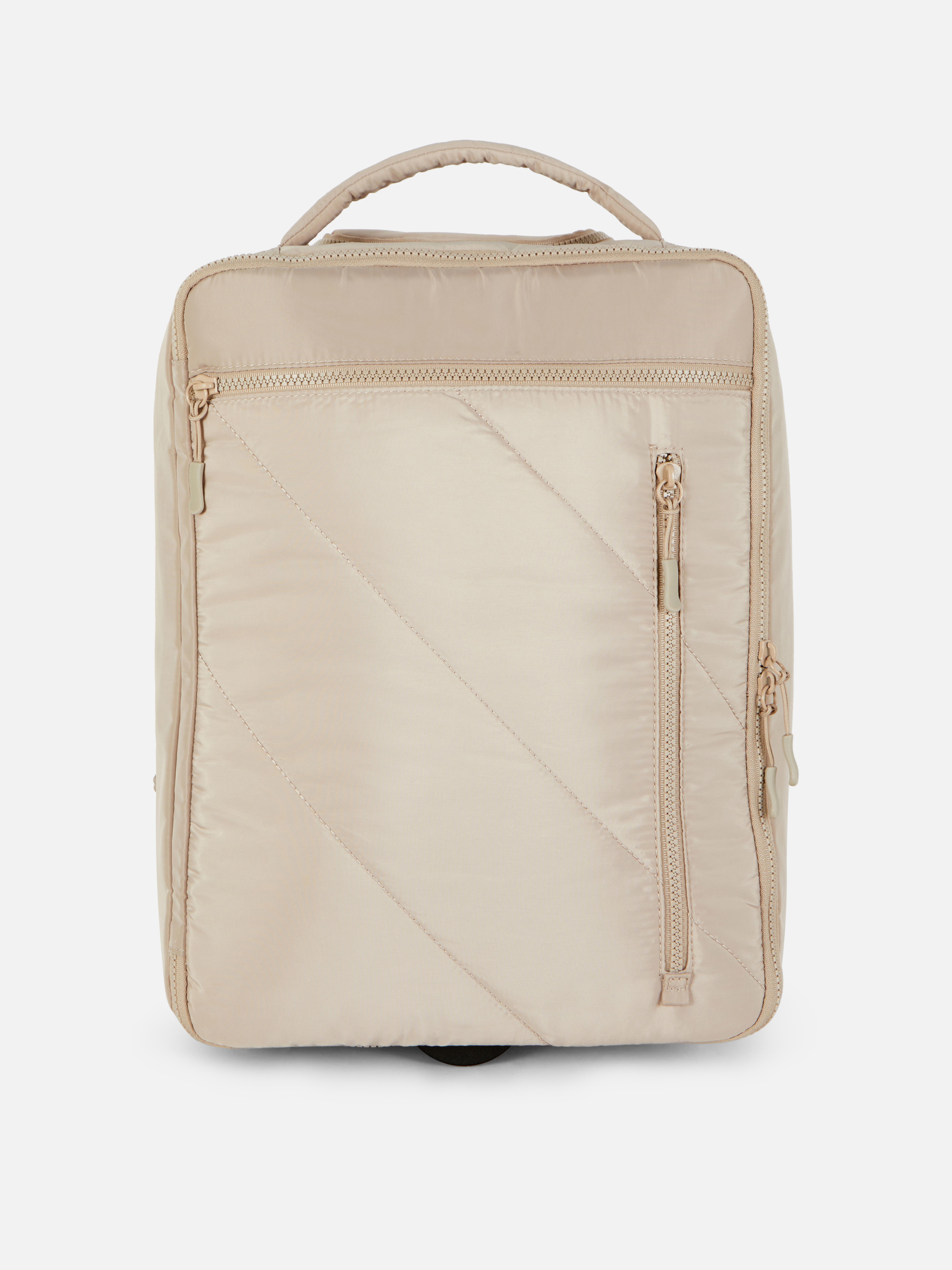 Rucsac tip troleu Un rucsac tip troleu cu compartimente multiple de depozitare, plus un mâner extensibil și roți