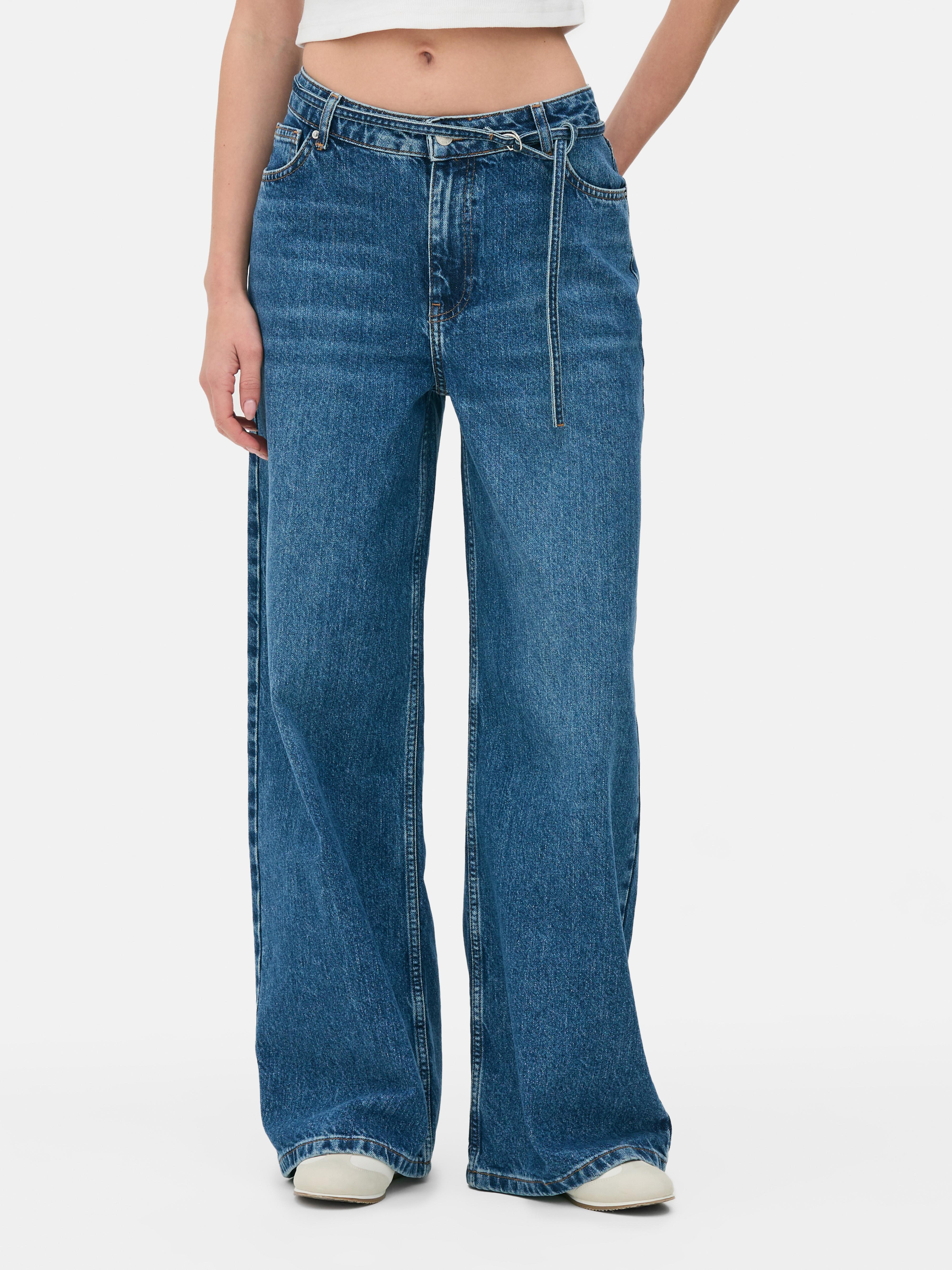 Blugi cu croială lată și curea cu inel D. Blugi din denim cu o siluetă lată și curea cu inel D.