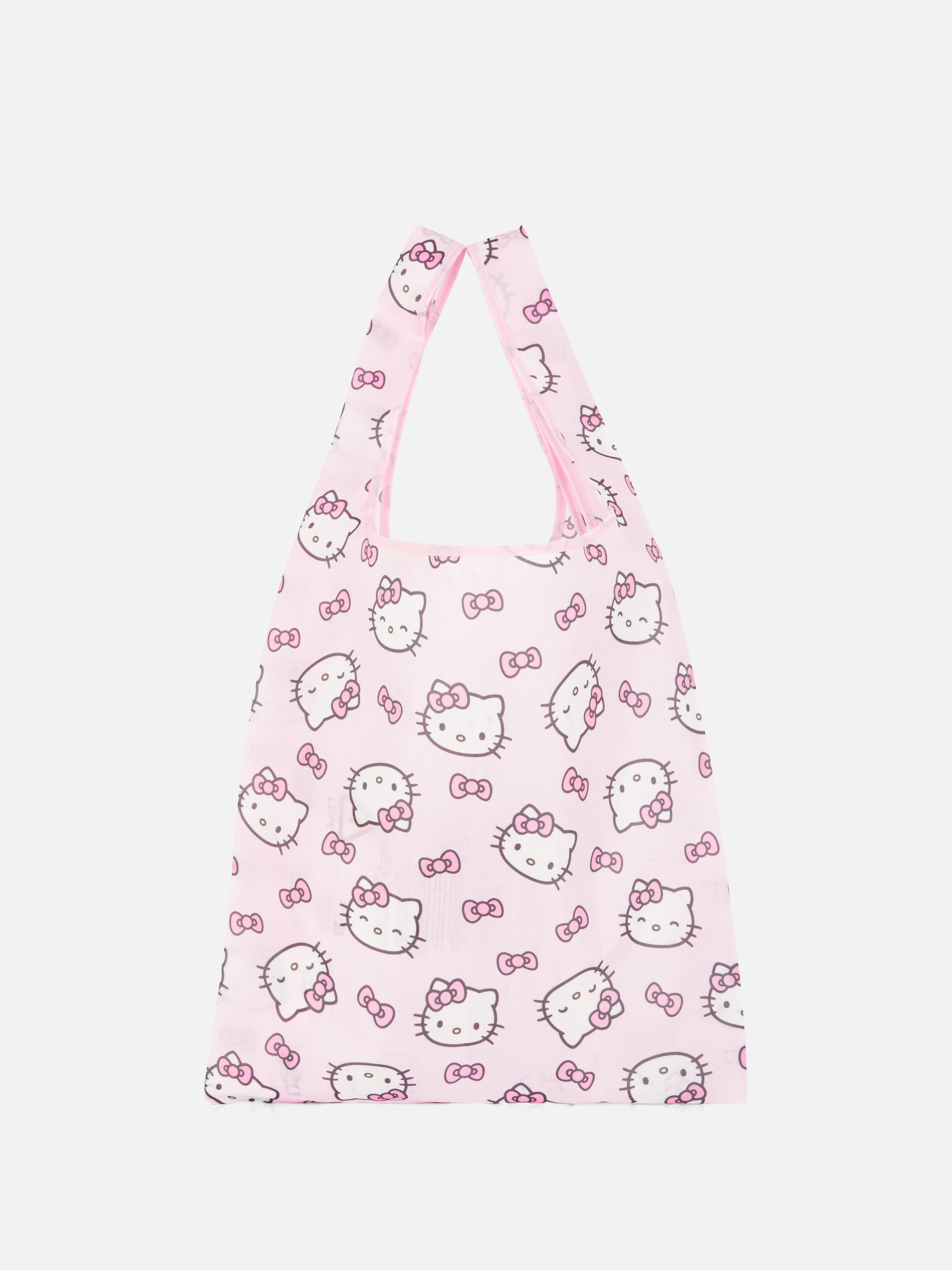 Geantă pliabilă Hello Kitty. O geantă drăguță cu model Hello Kitty, care poate fi pliată pentru depozitare ușoară.