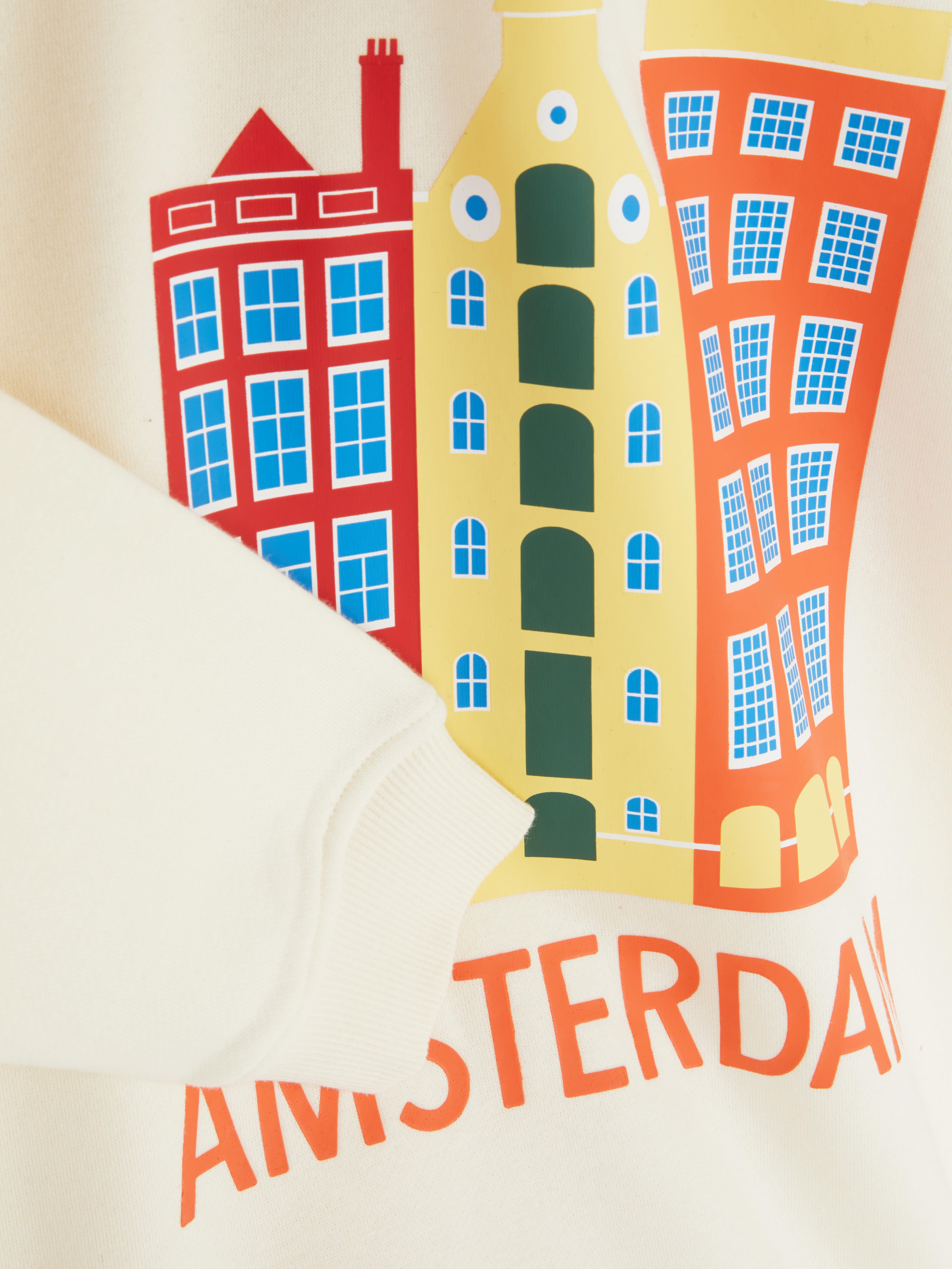 Sweatshirt für Kinder mit Amsterdam-Motiv. Ein Sweatshirt mit Rundhalsausschnitt, gerippten Bündchen und einem Aufdruck von Amsterdam auf der Vorderseite.