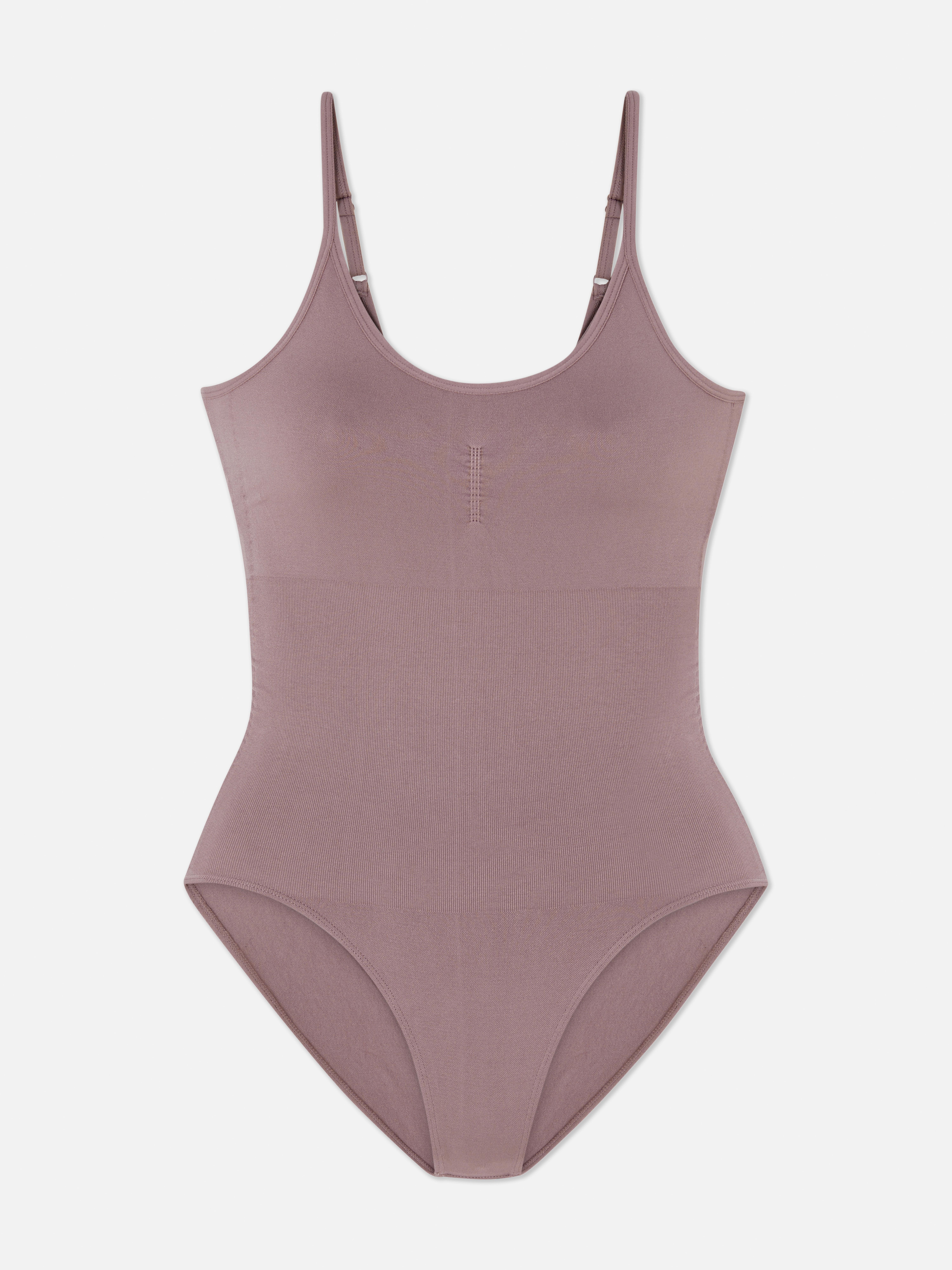 Bezšvové tvarujúce body s výstrihom do U. Toto korekčné body je perfektnou základnou vrstvou pre váš každodenný outfit.