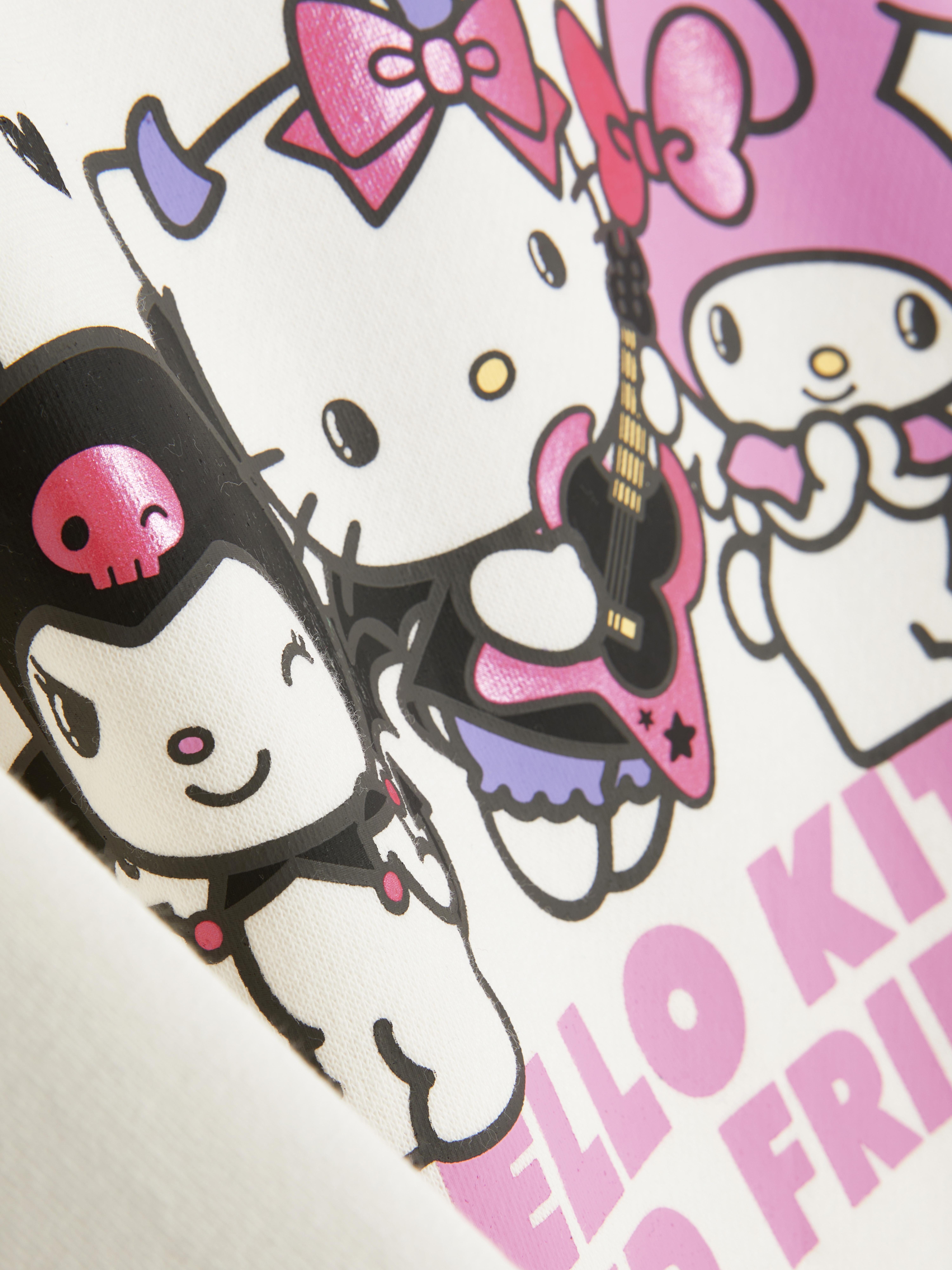 Hello Kitty und Freunde Print-Hoodie Ein Hoodie mit überschnittenen Schultern, gerippten Bündchen und Sanrio-Figuren