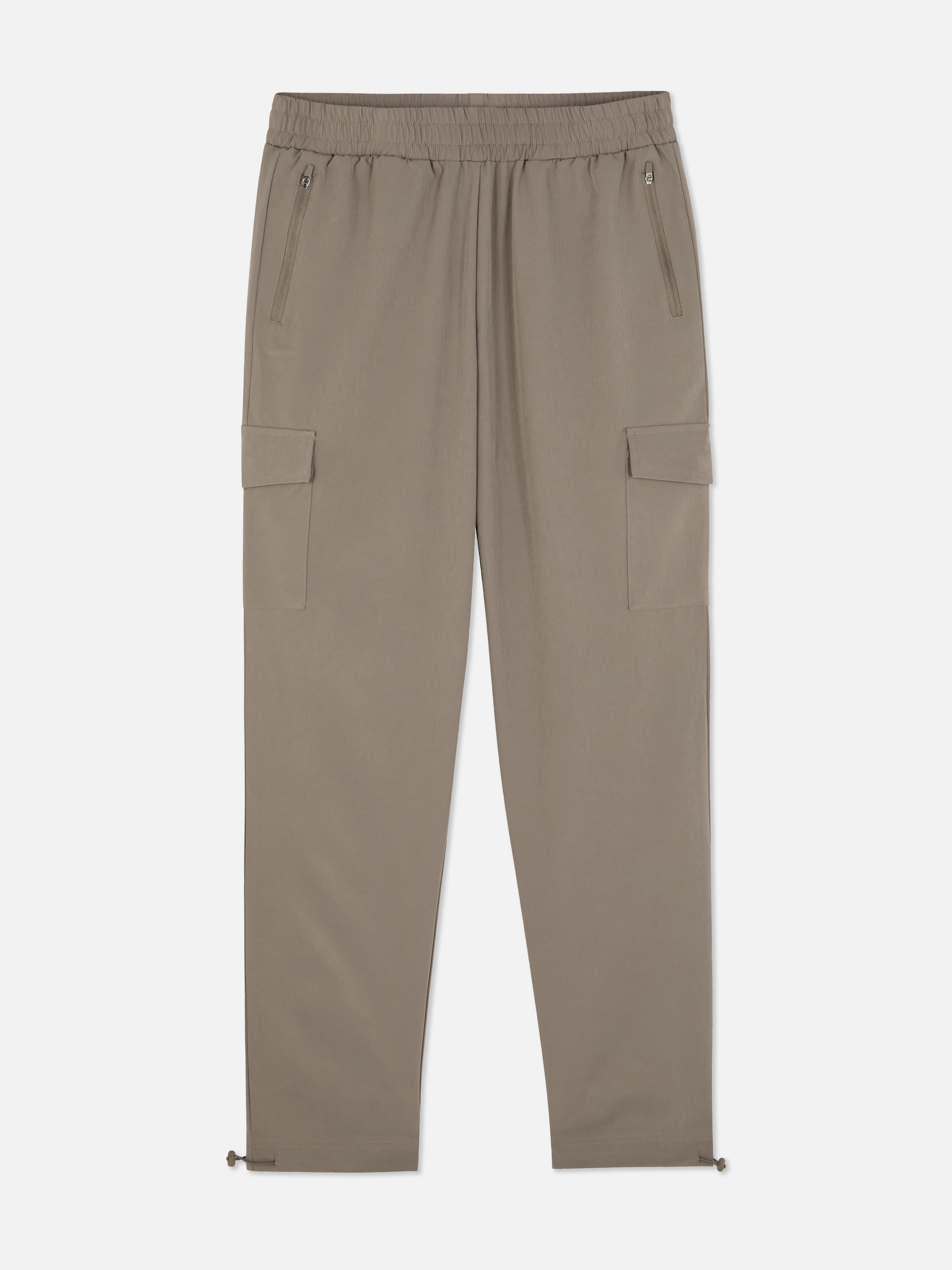 Woven cargo sweatpants Woven sweatpants with stretchy waist, cargo pockets and adjustable ankle cuffs