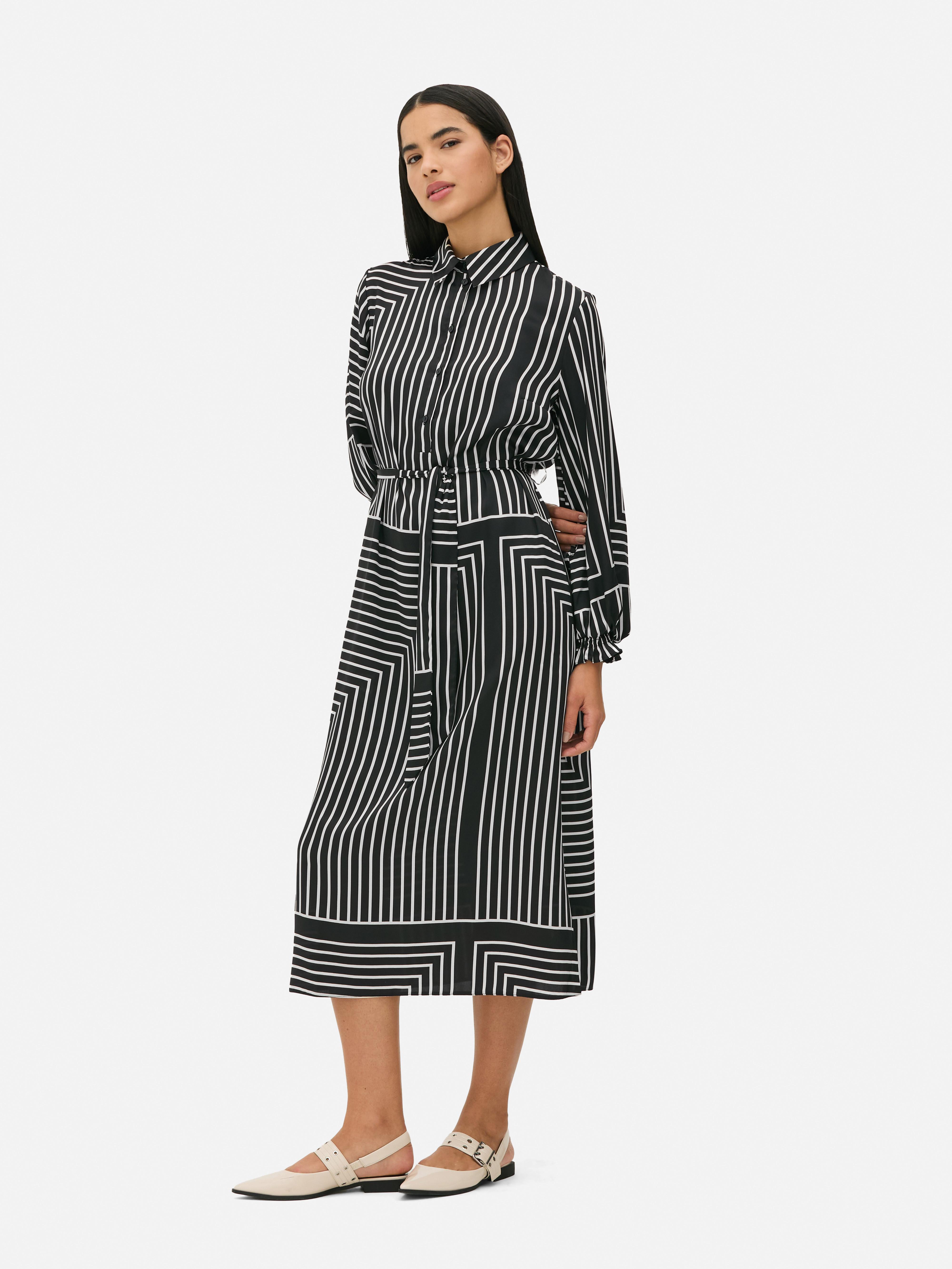 Shirt dress with paisley print. Give a nod to the 70s with this shirt dress with a paisley print.
