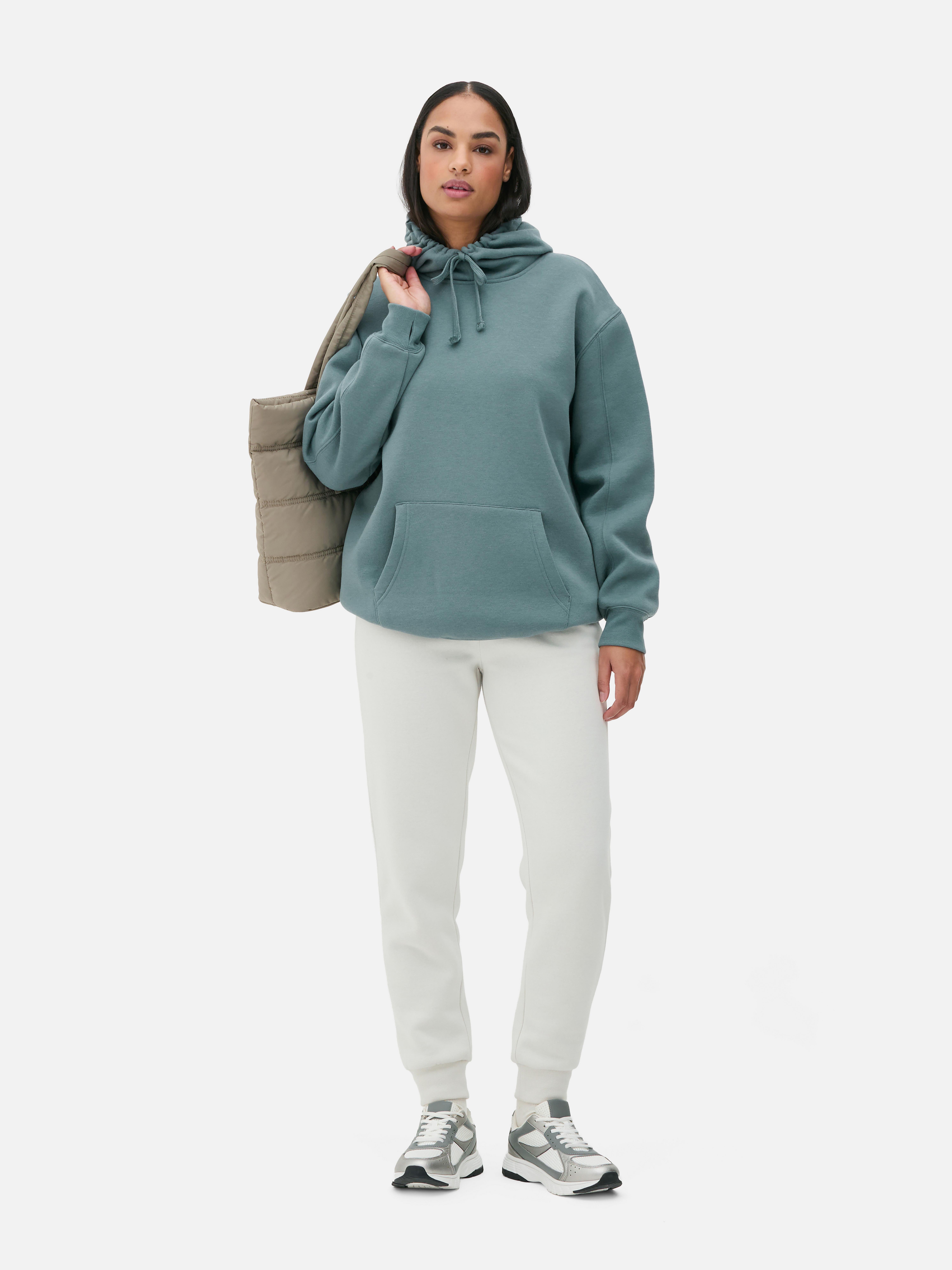 Κλασικό oversized φούτερ με κουκούλα Ένα casual oversized φούτερ με κορδόνι περίσφιξης και τσέπη καγκουρό