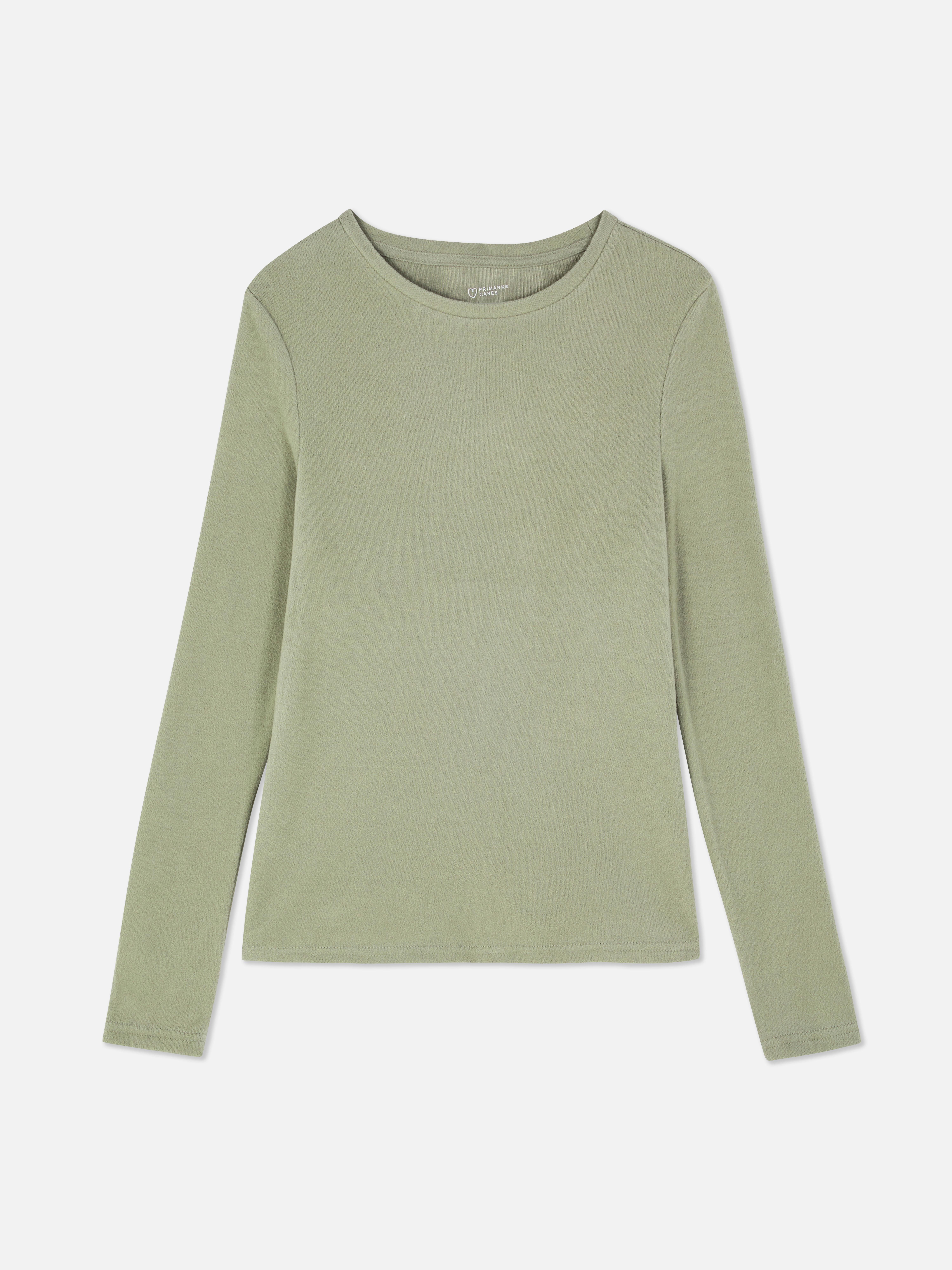 Top din fleece cu mânecă lungă. Rămâi minunat de cald cu acest top cu decolteu rotund și mâneci lungi.