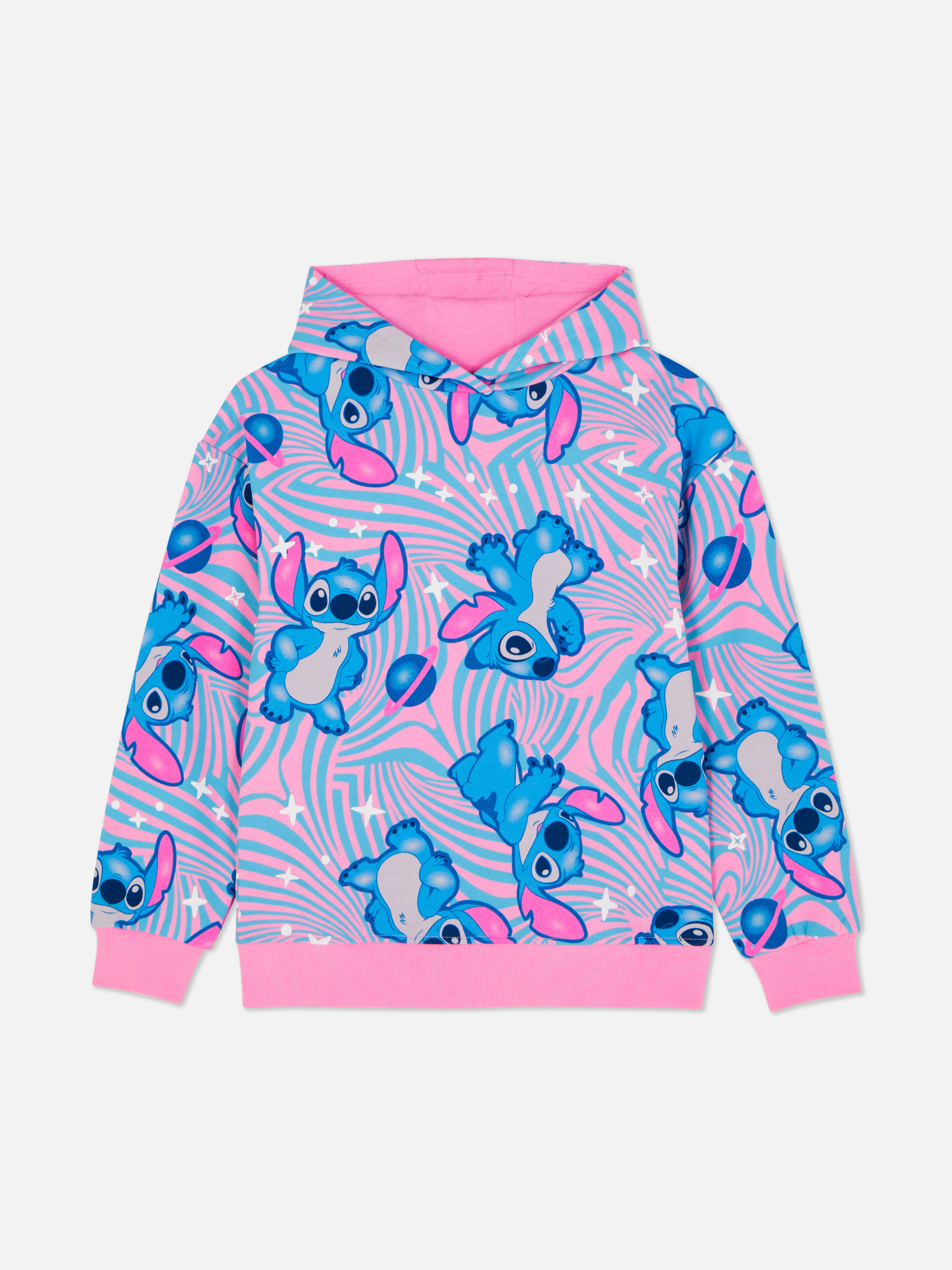 Hanorac cu imprimeu Disney Stitch. Acest hanorac cu imprimeu Disney Stitch are umeri căzuți și manșete cu nervuri.
