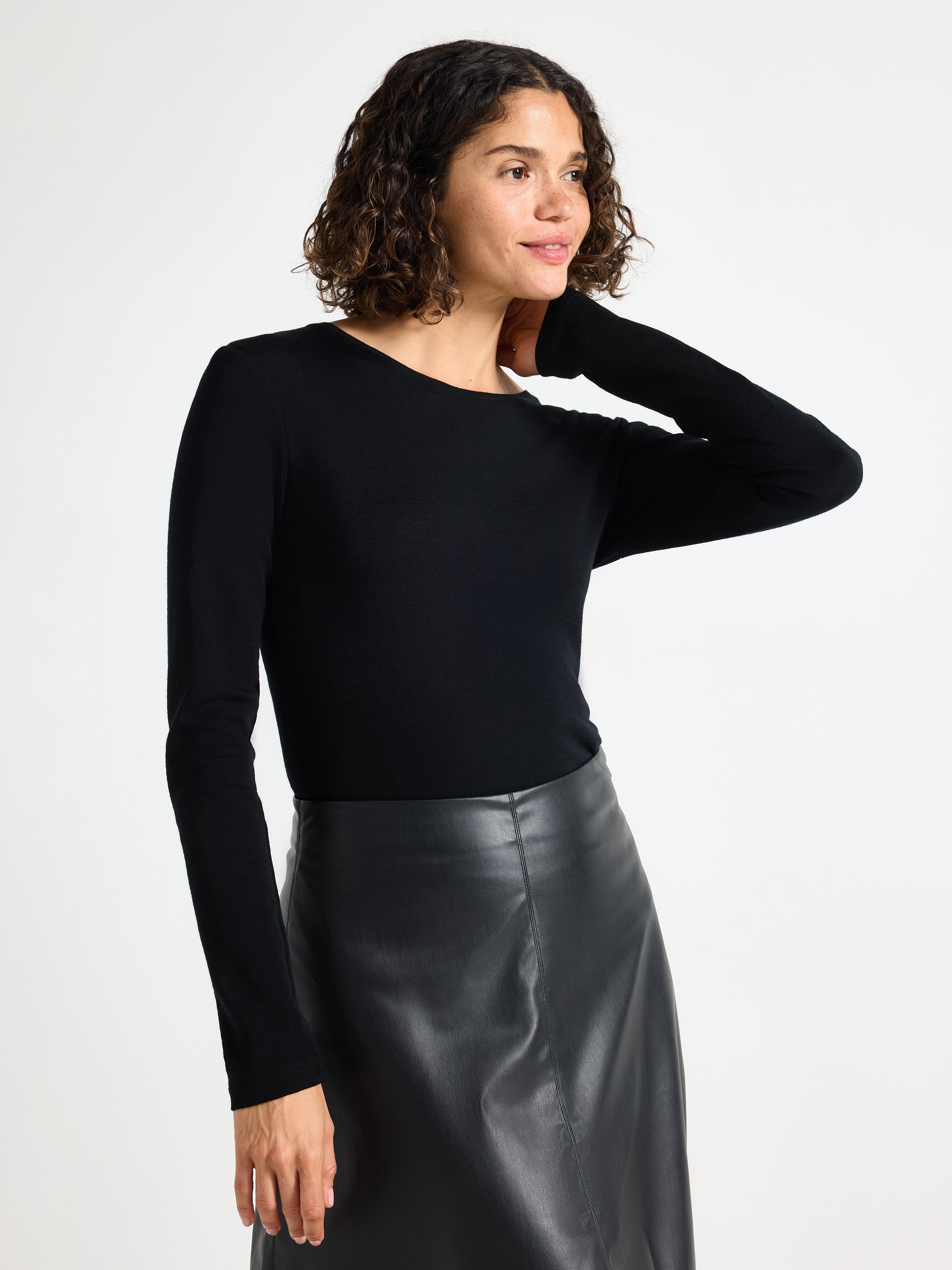 Top de manga larga de lana merino negro