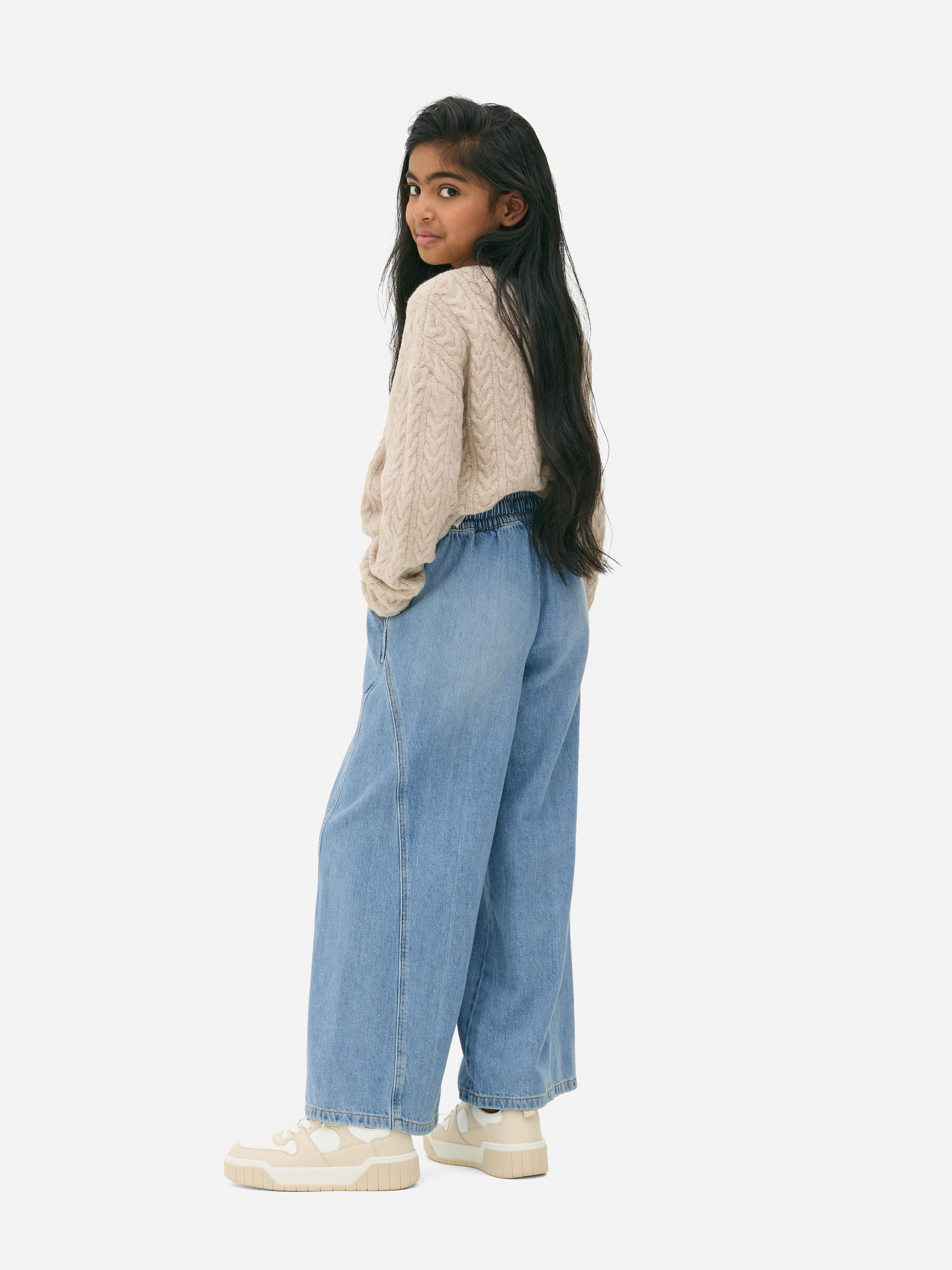 Jeans met wijde pijpen en trekkoord Een denim jeans met trekkoord, elastische taille, zakken en wijde pijpen