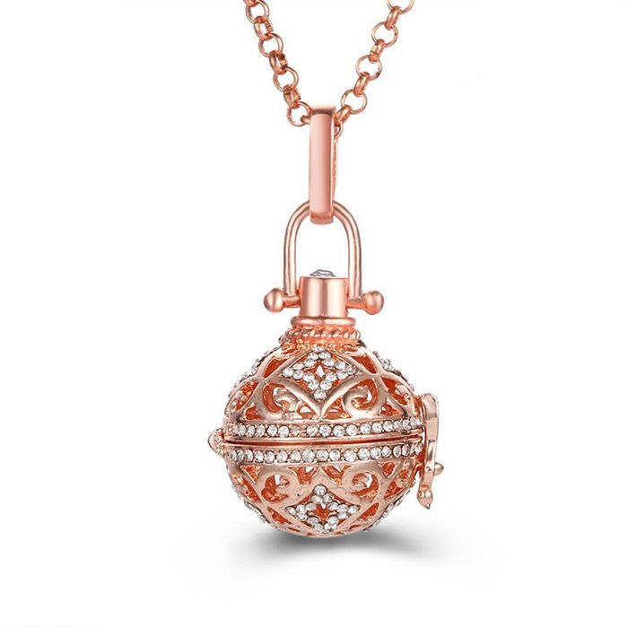 Pregnancy Bola Necklace & Aromatherapy. The cage holds a cotton ball infused with perfume or essential oil.