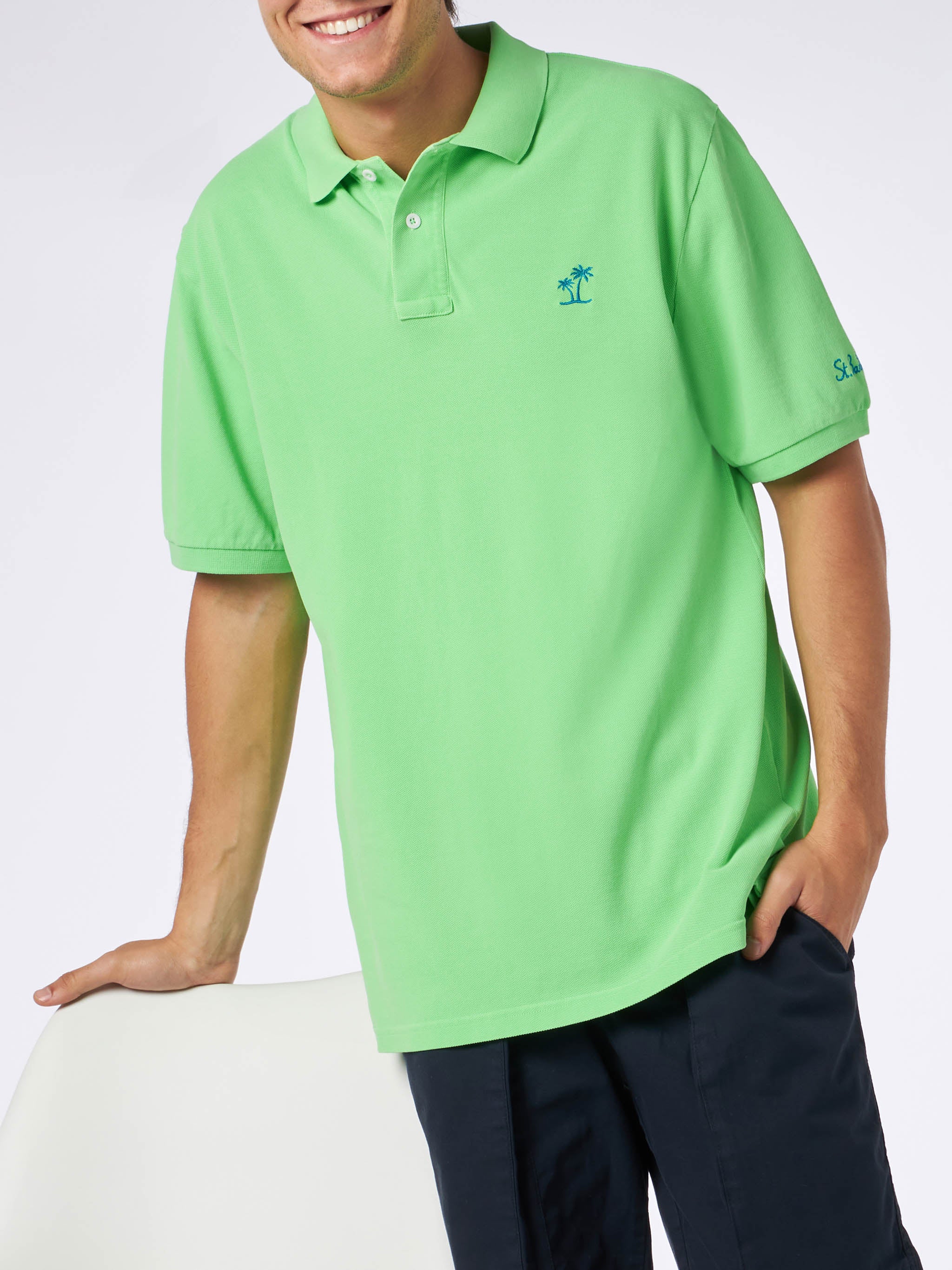 Polo da uomo in piquet verde fluo con logo St. Barth ed effetto vintag