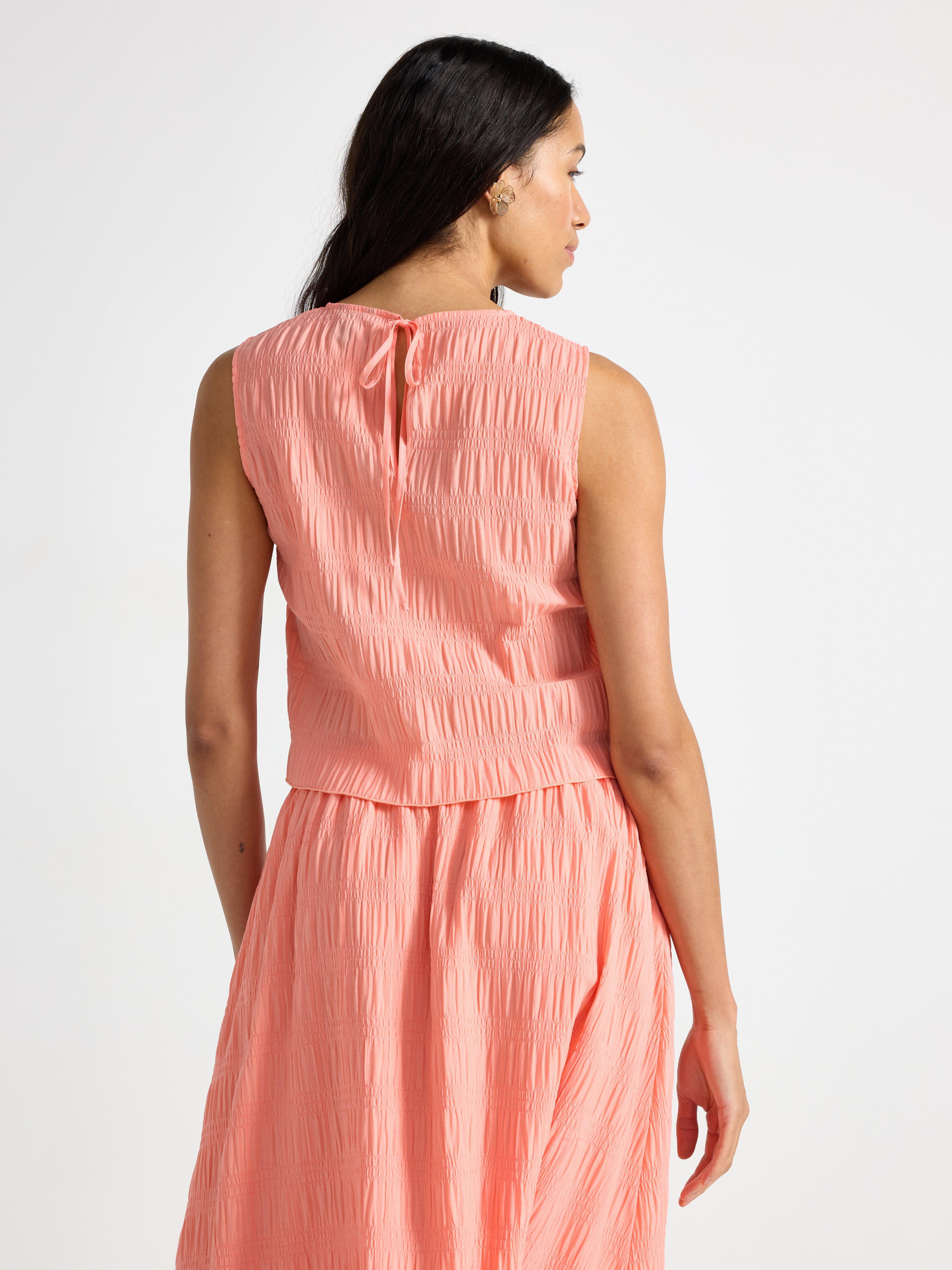 Blusa sem mangas coral claro