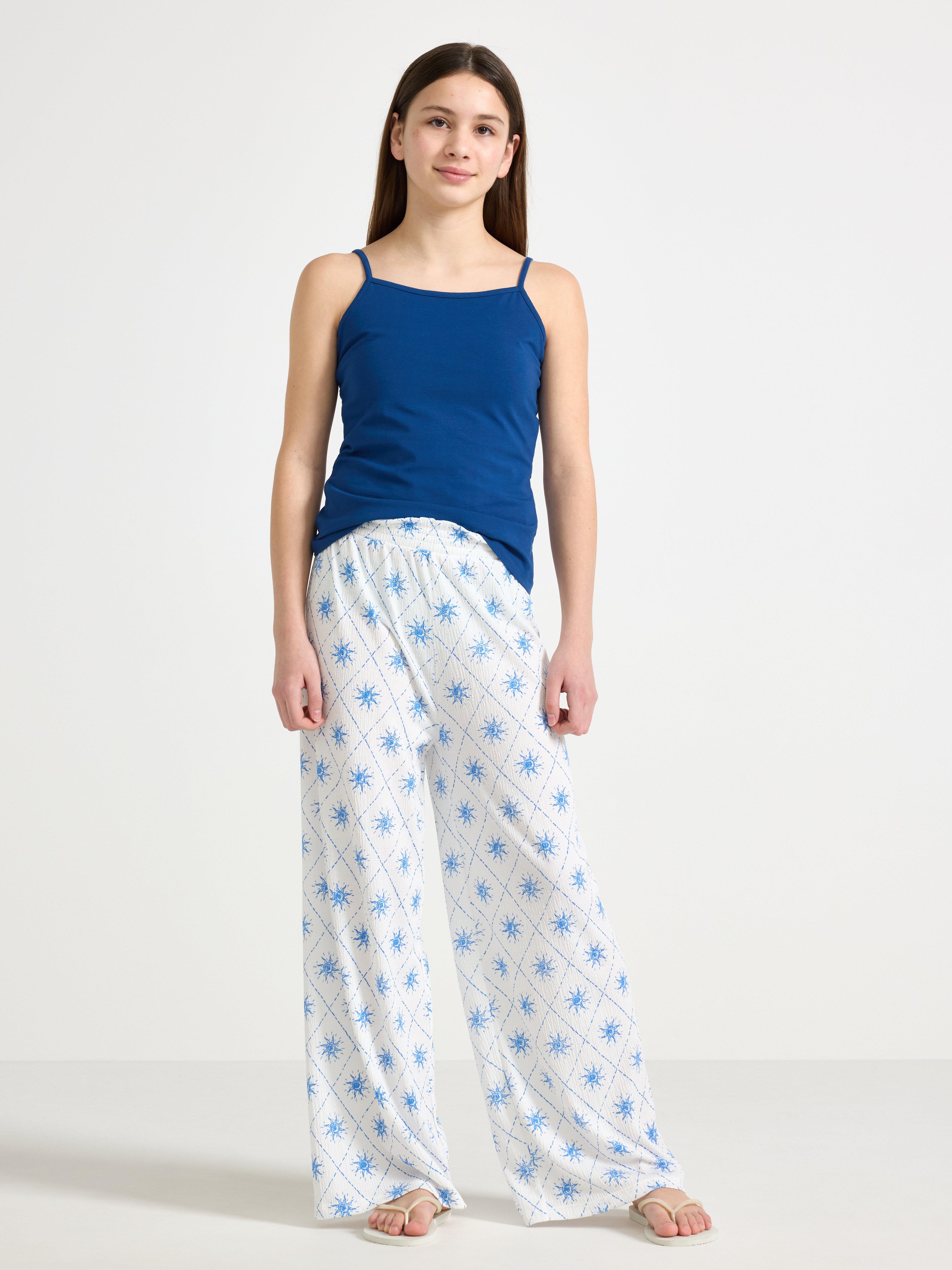 Pantalones de pierna ancha en punto color blanco roto