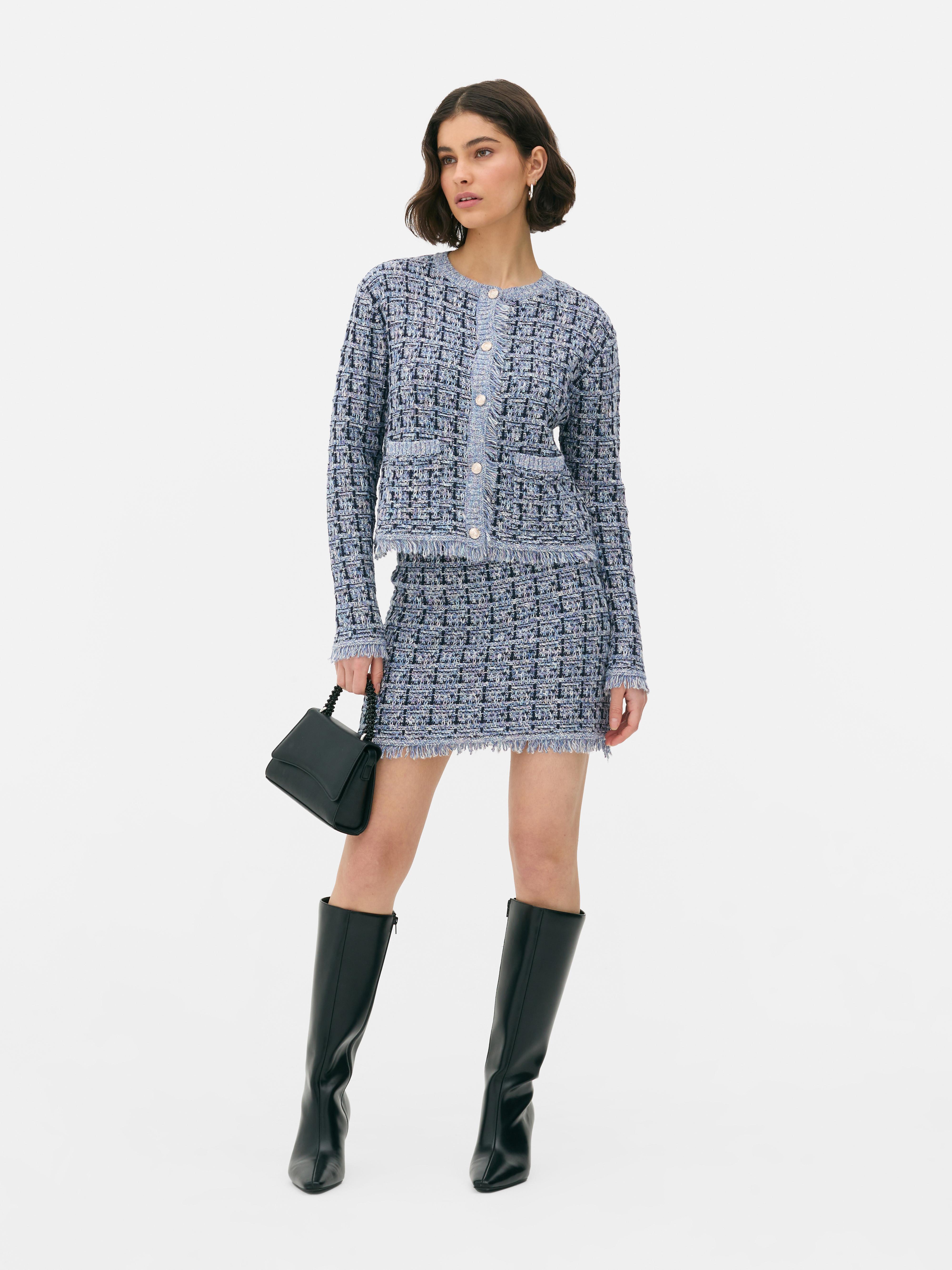 Glänzende Tweed-Strickjacke: Mit dieser trendigen Tweed-Strickjacke bleiben Sie schick.