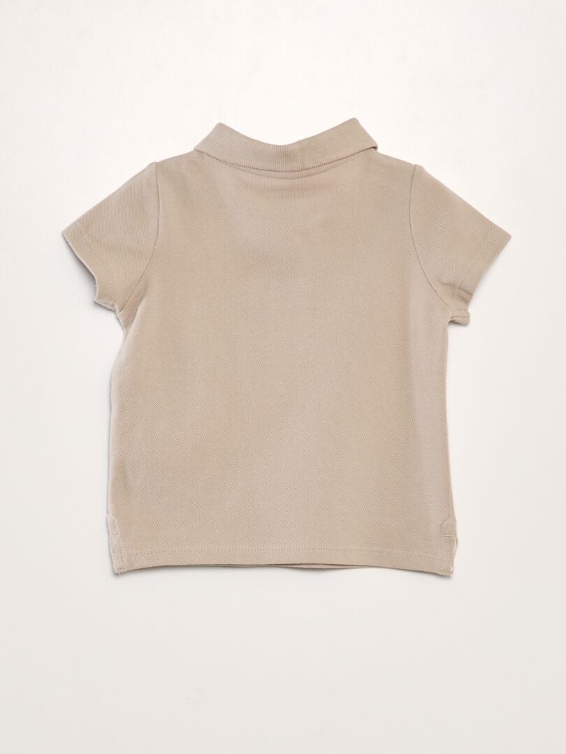 Polo shirt van katoenen piqué met palmbomenmotief - BEIGE