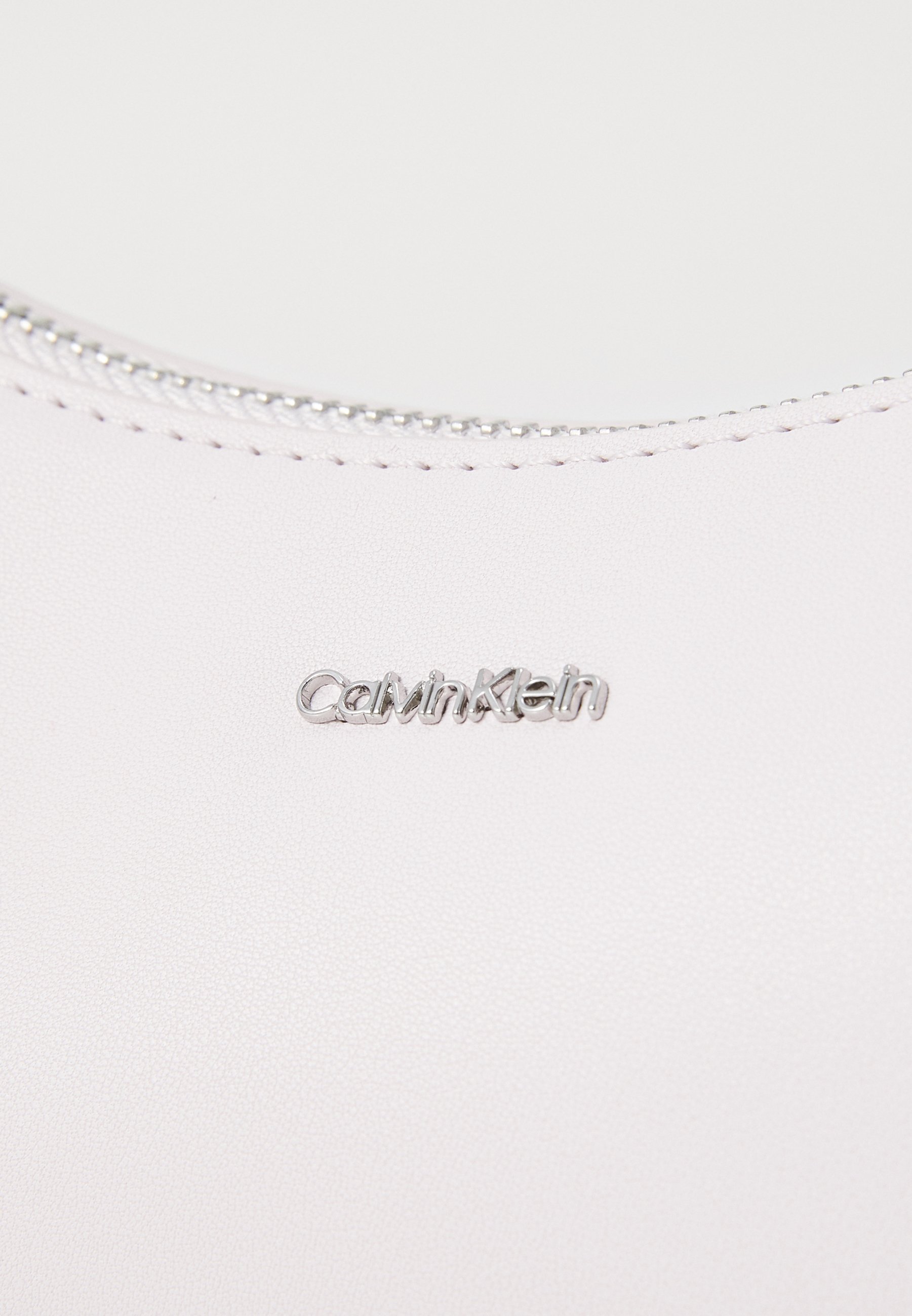 Sac bandoulière Calvin Klein MUST petit modèle - Orchidée Glace
