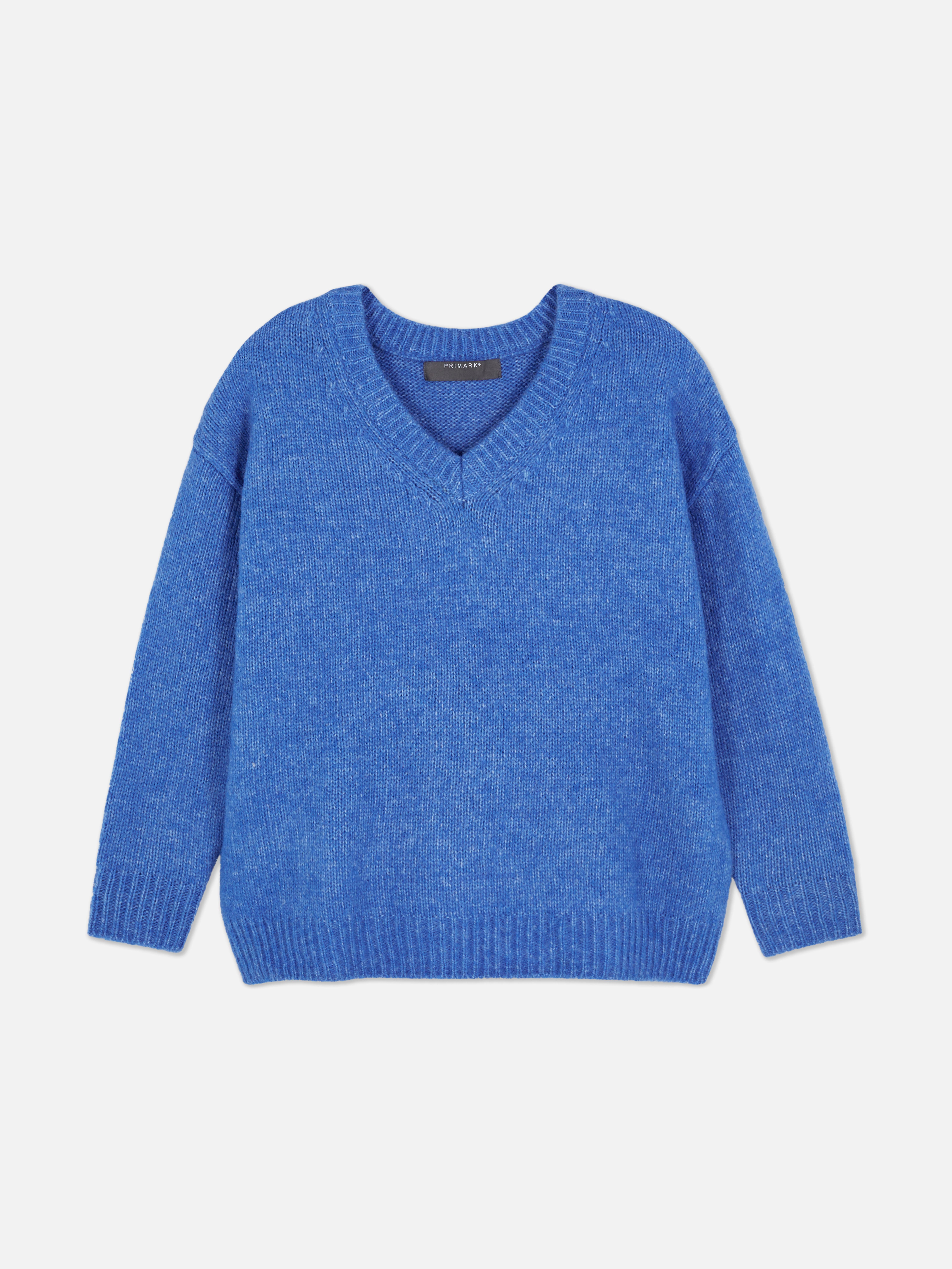 Locker geschnittener Pullover mit V-Ausschnitt, überschnittenen Schultern, gerippten Bündchen und angerauter Oberfläche