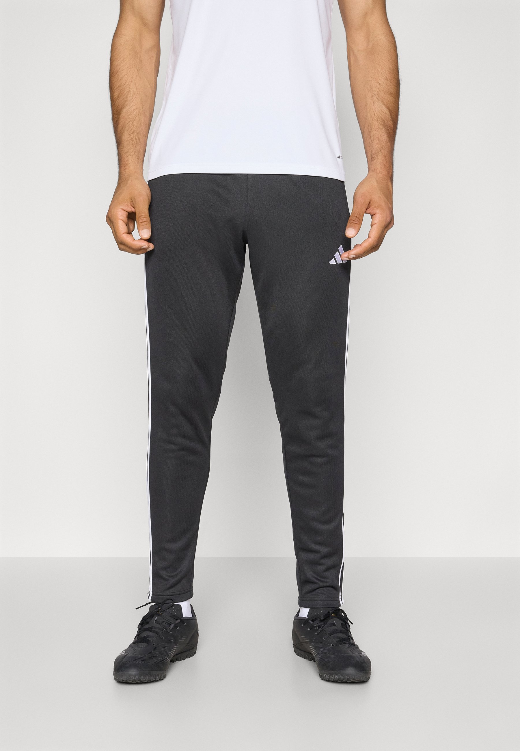 Pantaloni da allenamento invernali adidas Performance TIRO25 ESSENTIALS - Pantaloni della tuta - nero/bianco