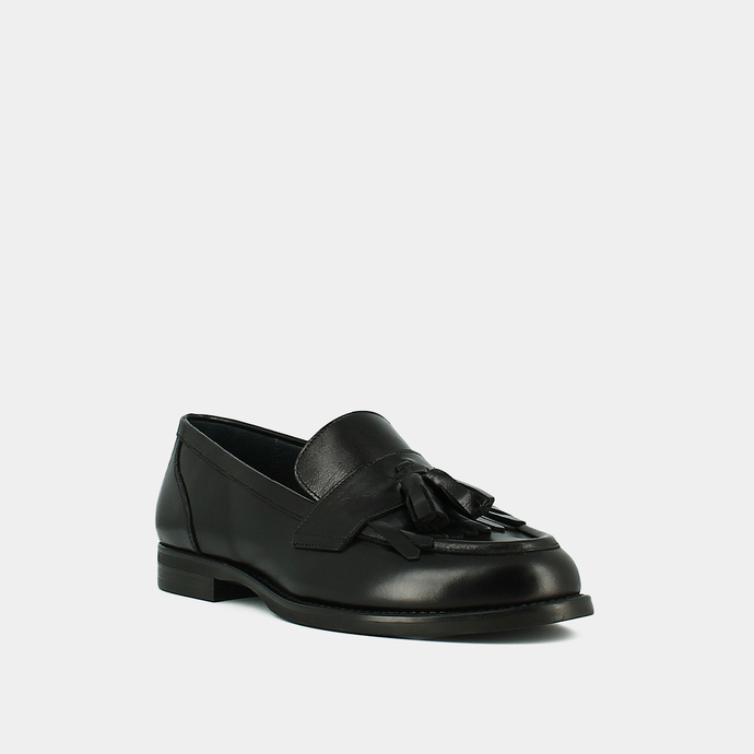 Mocassins à talons plats et pompons  en cuir noir