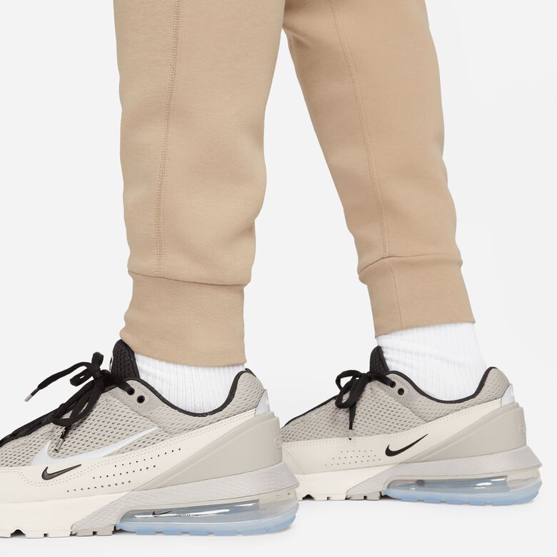 Pantalones deportivos ajustados de tejido técnico polar