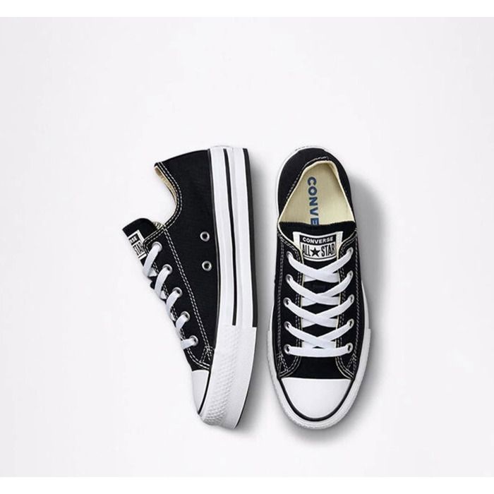 Converse CTAS Platfo Ox — Tênis de cano baixo infantil, preto, com cadarço e cabedal têxtil.