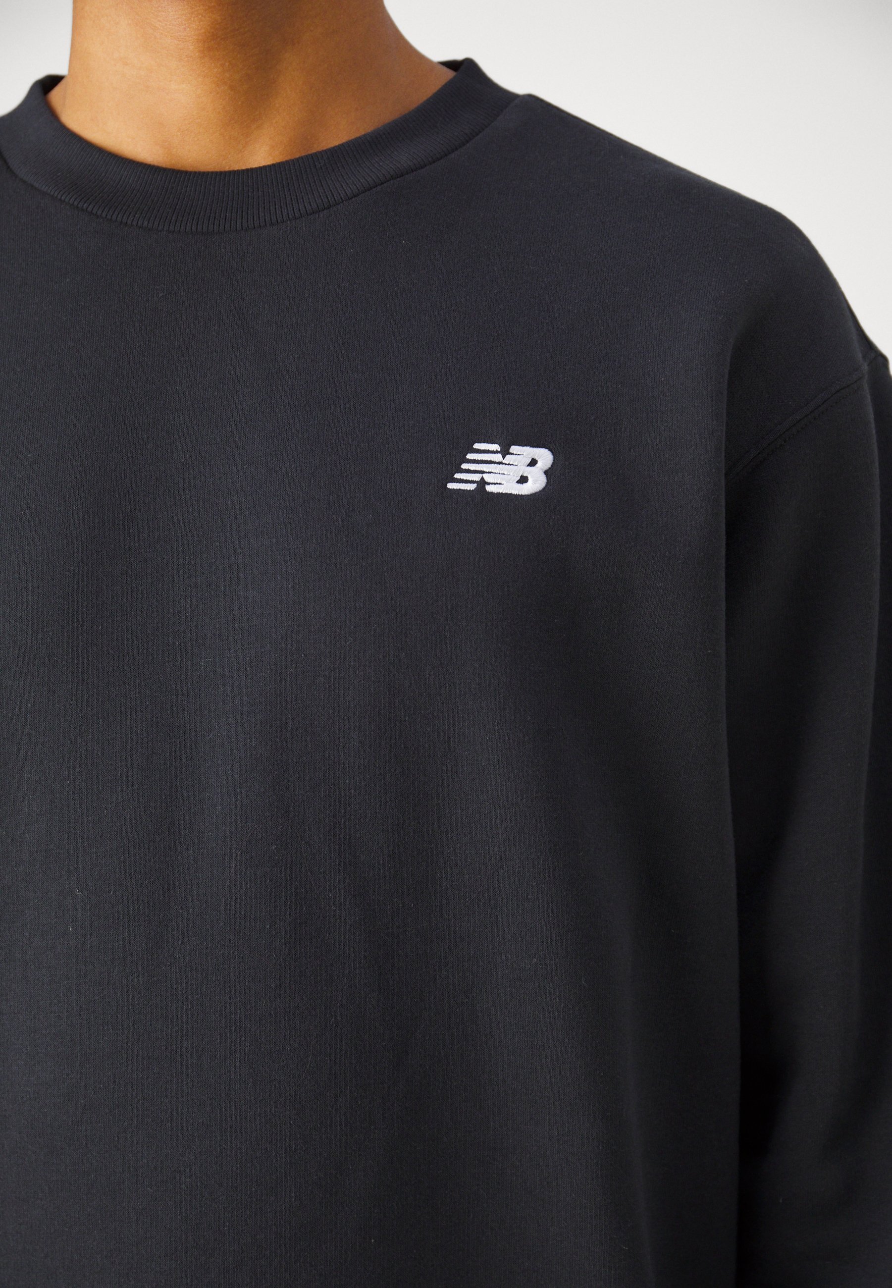 Felpa New Balance SPORT ESSENTIALS CREW UNISEX - nera
