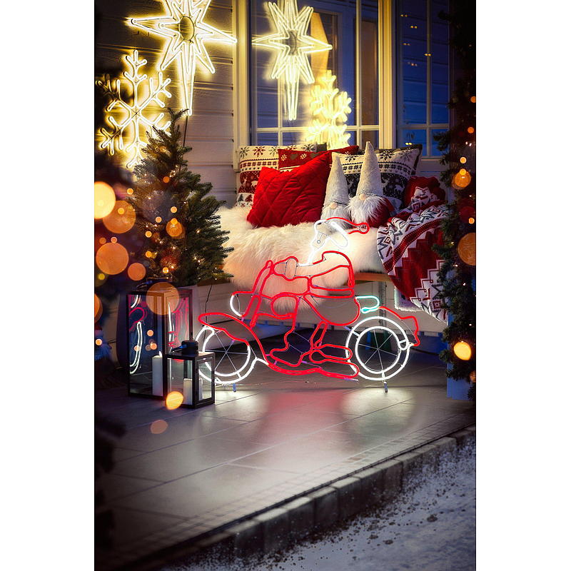 Energiezuinig lichtreclame met de Kerstman op een motorfiets