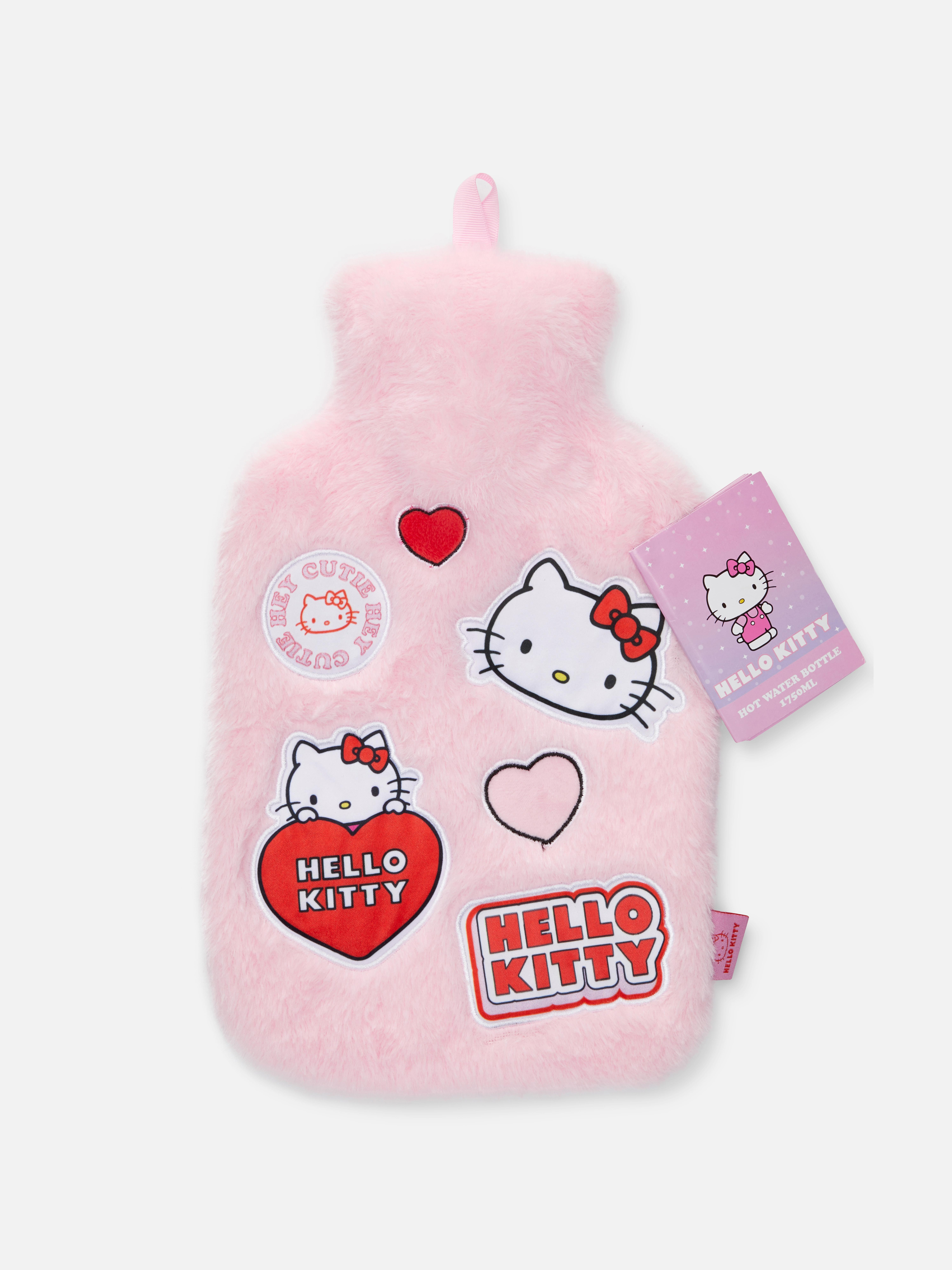 Sticla cu apă caldă Hello Kitty O sticlă cu apă caldă cu o husă moale Hello Kitty și detalii aplicate