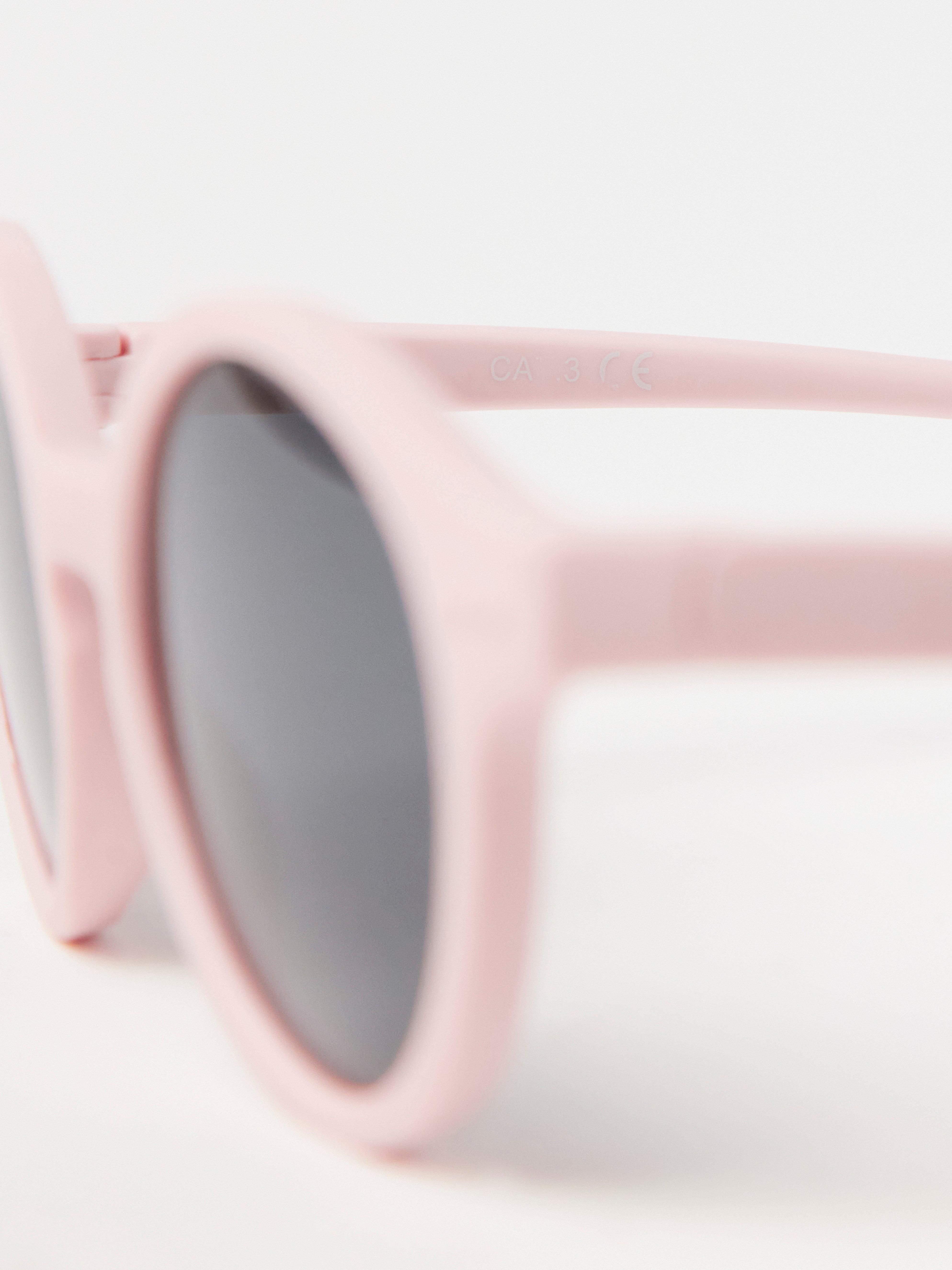 Ochelari de soare roz deschis